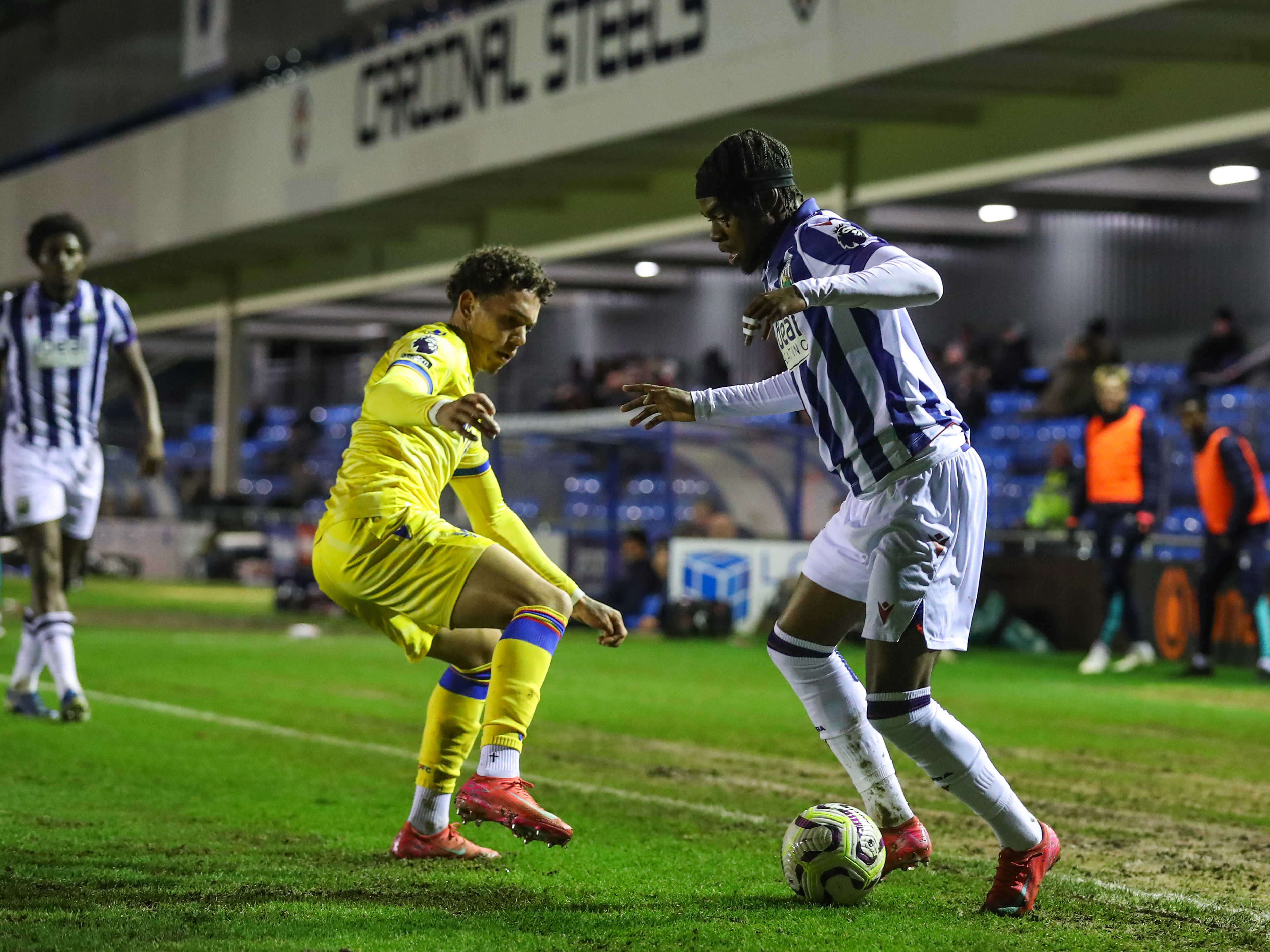 An image of Akeel Higgins on the ball during Albion's PL2 game against Crystal Palace