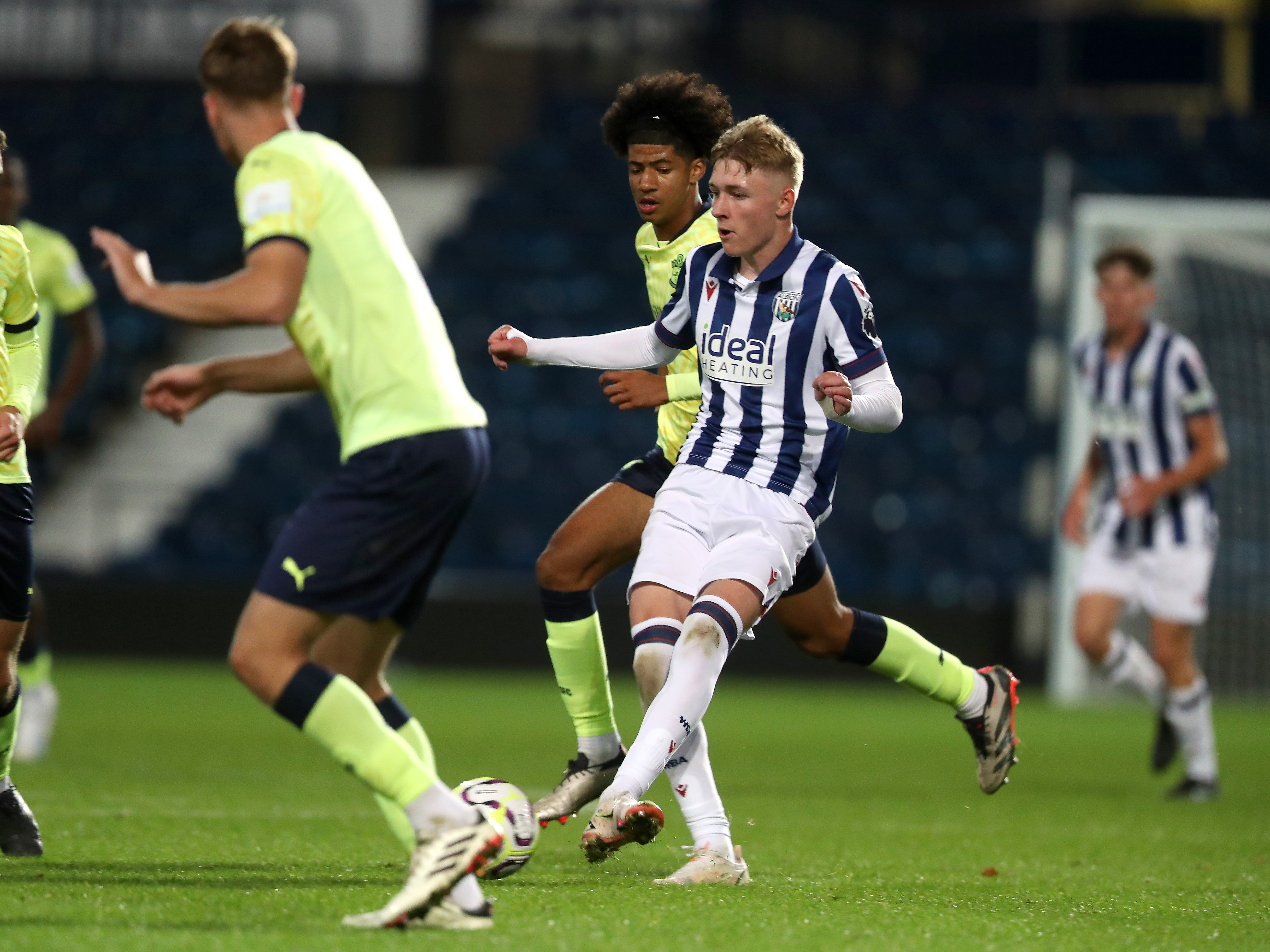 A photo of Albion youngster Ollie Bostock in action at The Hawthorns in the 2024/25 home kit