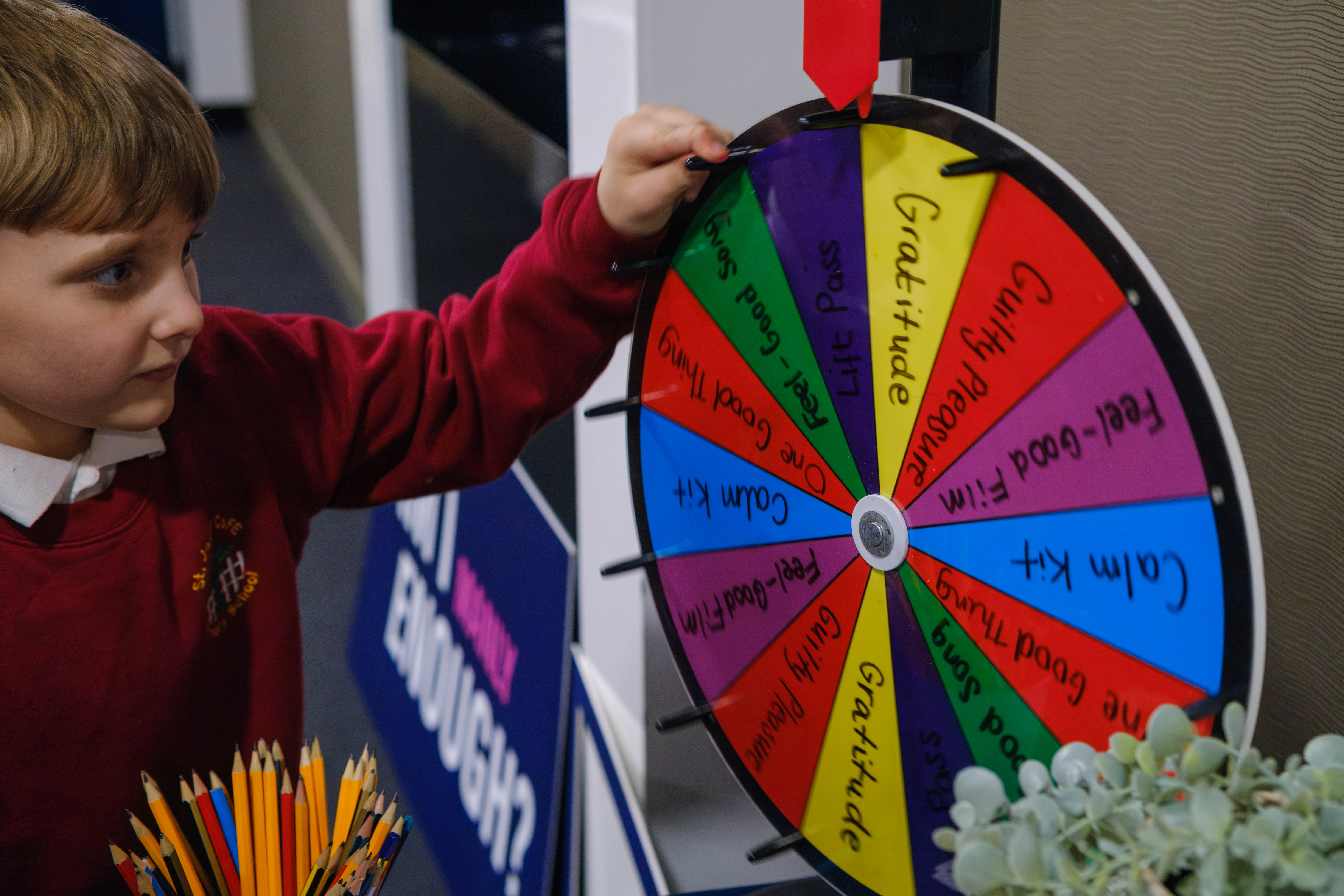 A child spins the wheel.