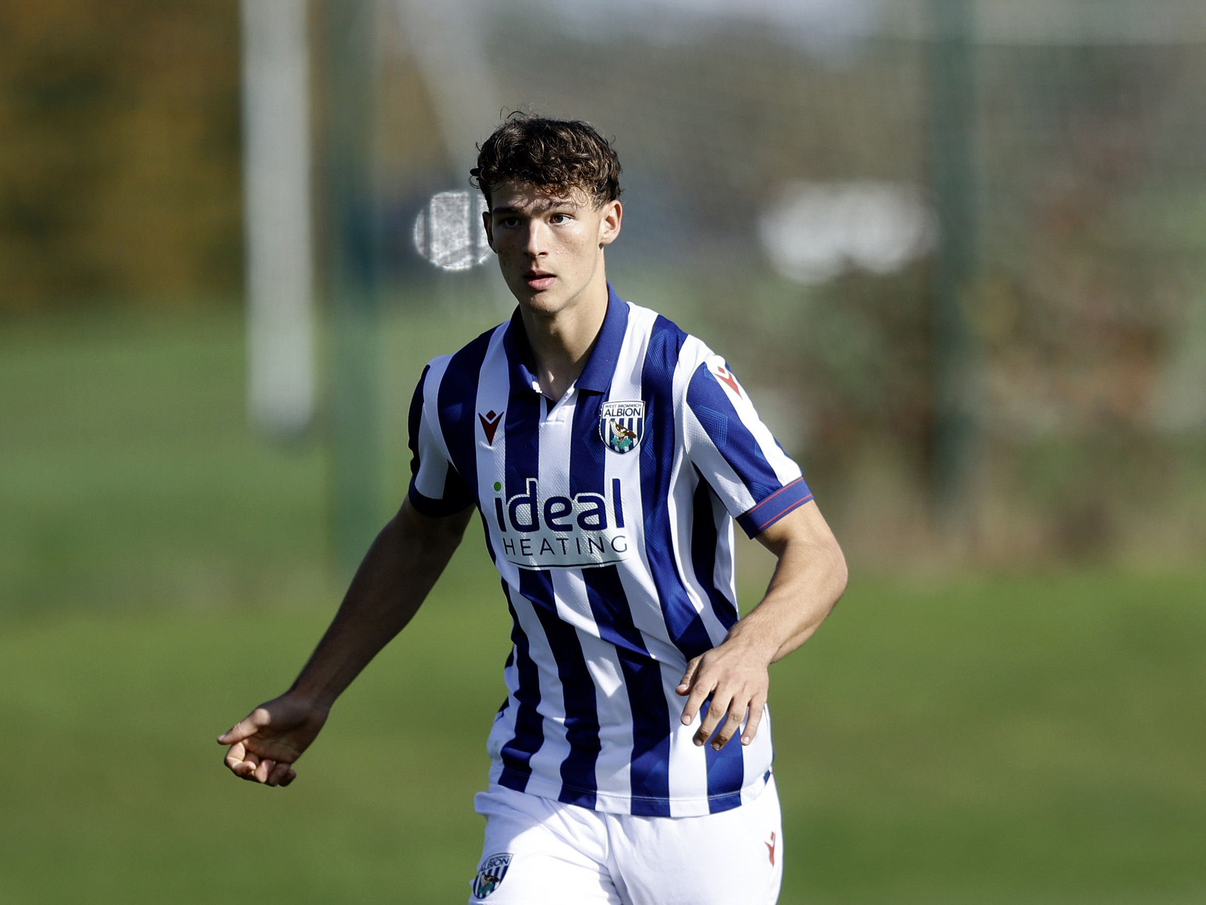 A photo of Albion U18 defender Noah Dupont in the 2024/25 home kit