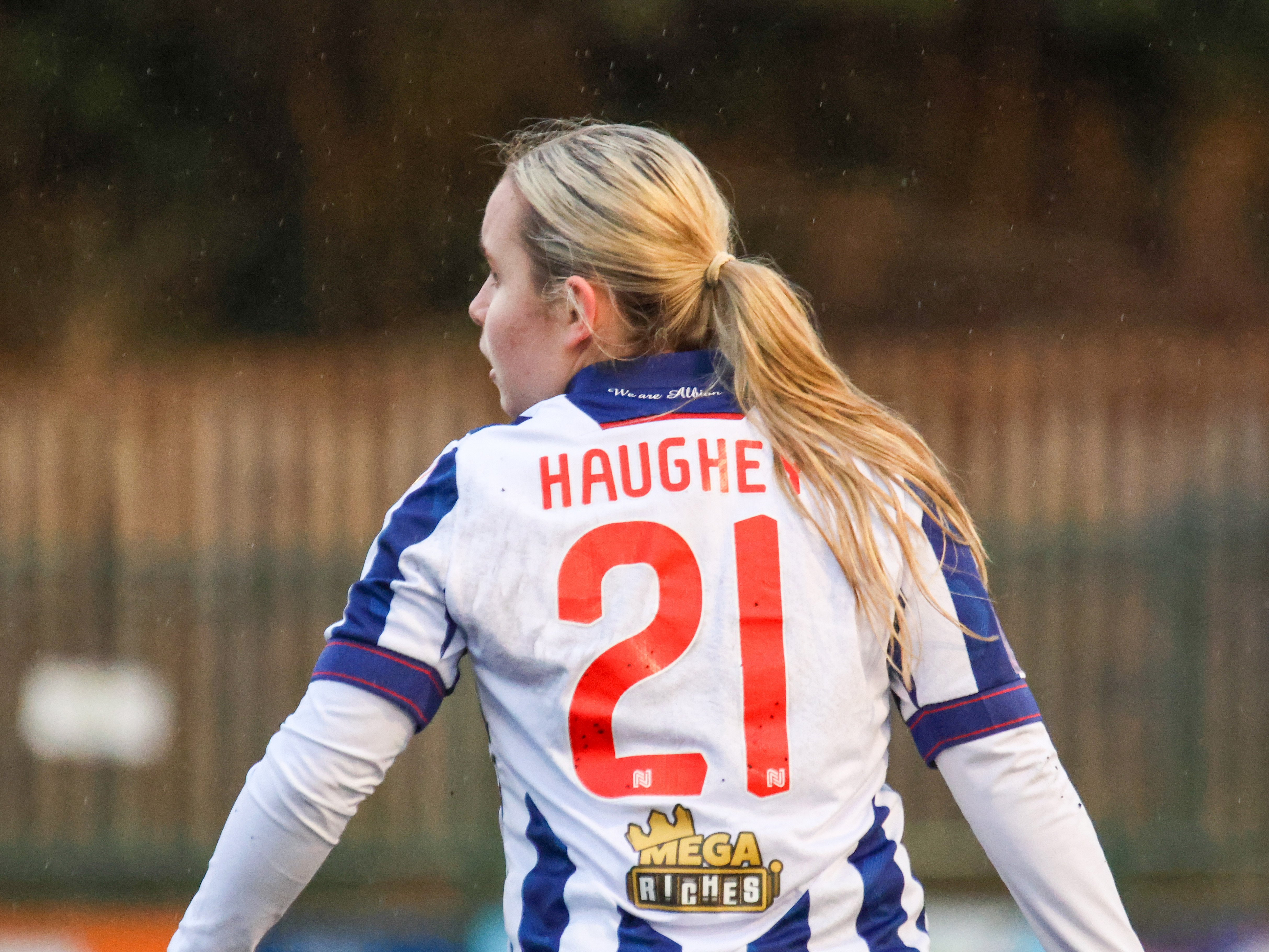 Ella Haughey in action for Albion in the home kit with her name and number 21 showing on the back of her shirt 