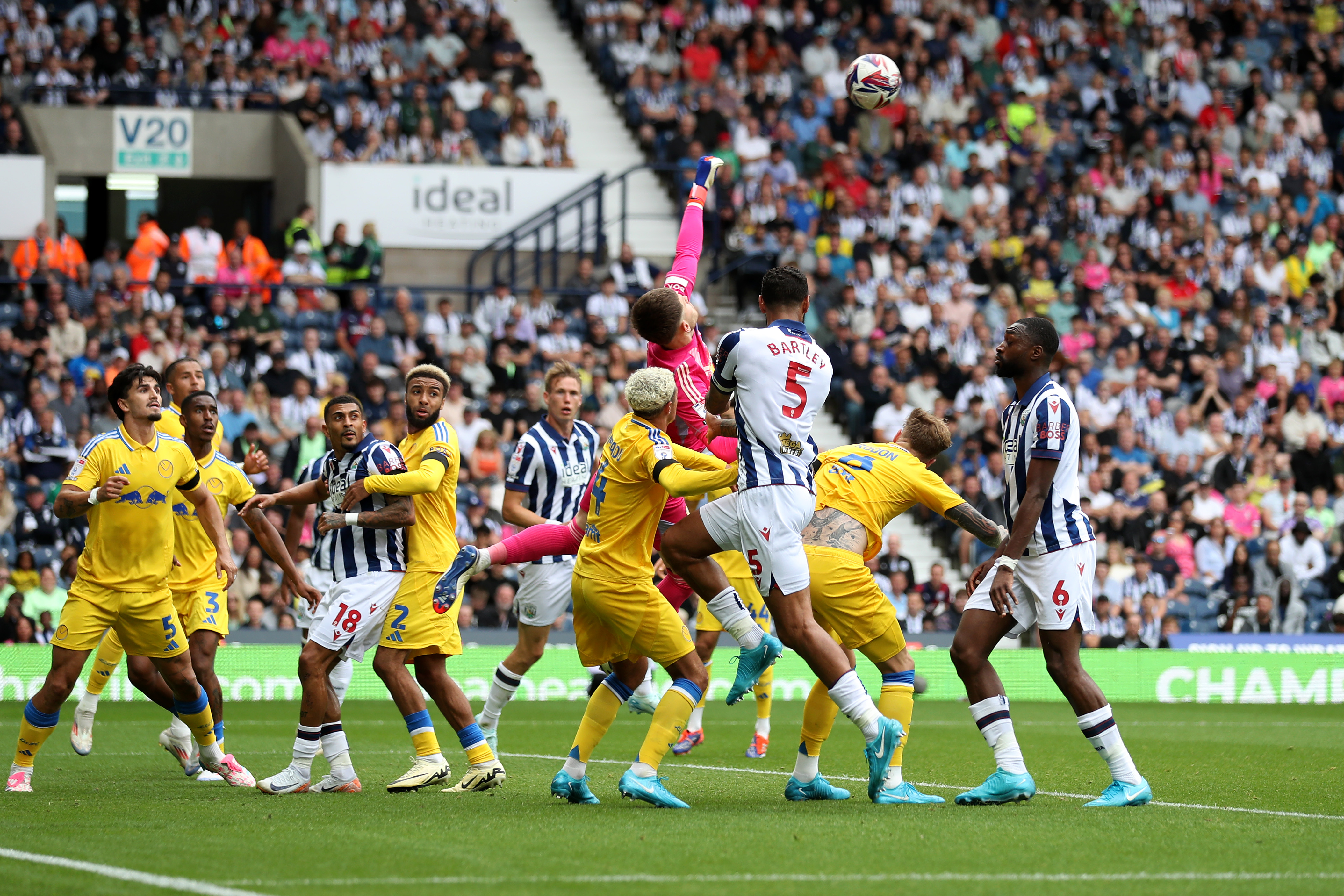 General match action in a crowded penalty area between Albion and Leeds at The Hawthorns in August 2024