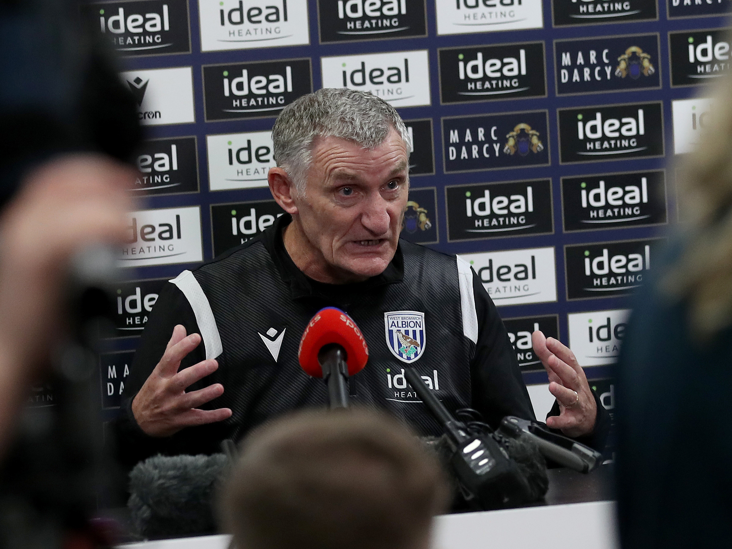 Tony Mowbray is interviewed in the media room at the Training Ground