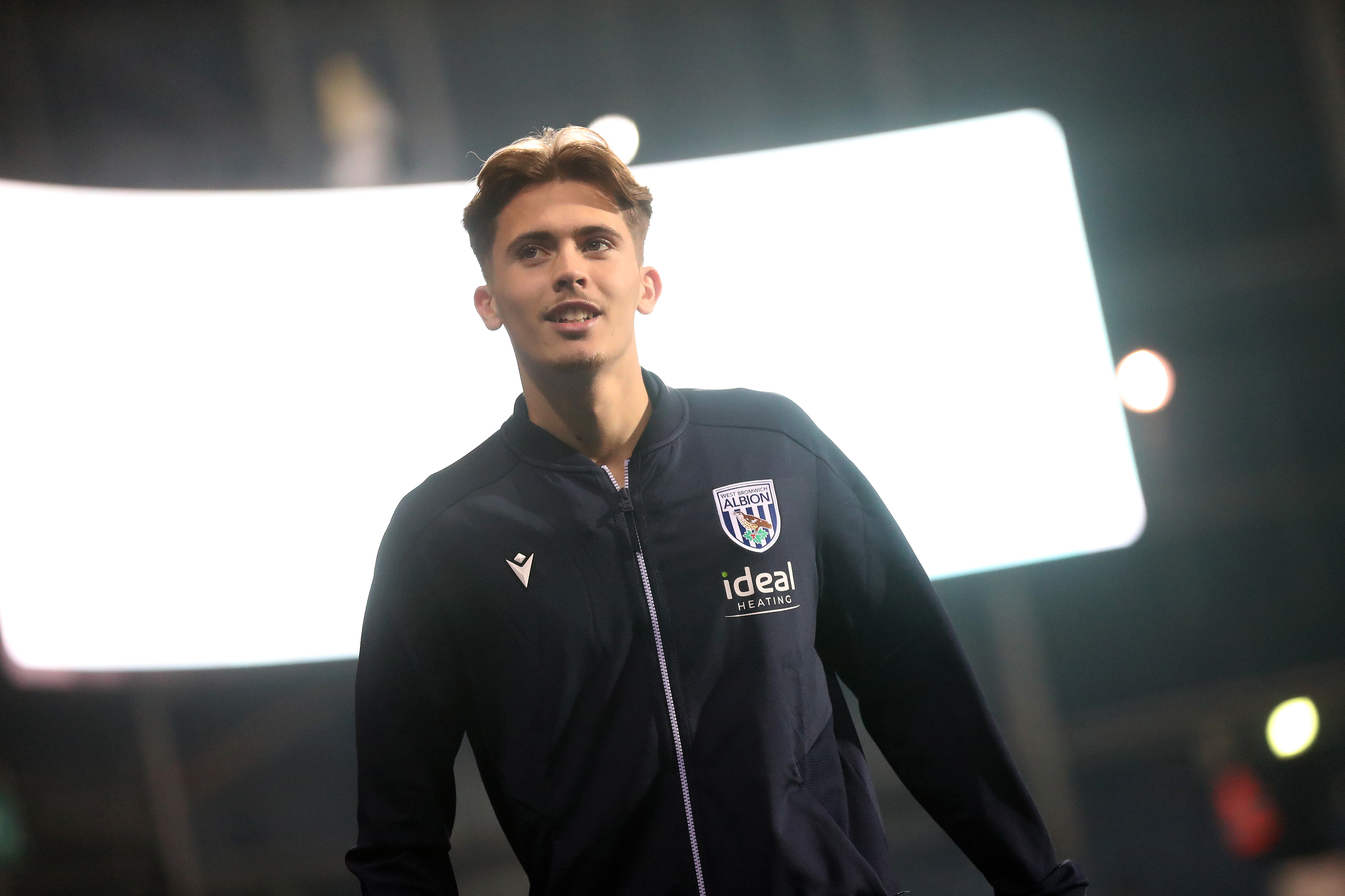 Isaac Price arriving at The Hawthorns in an Albion tracksuit 