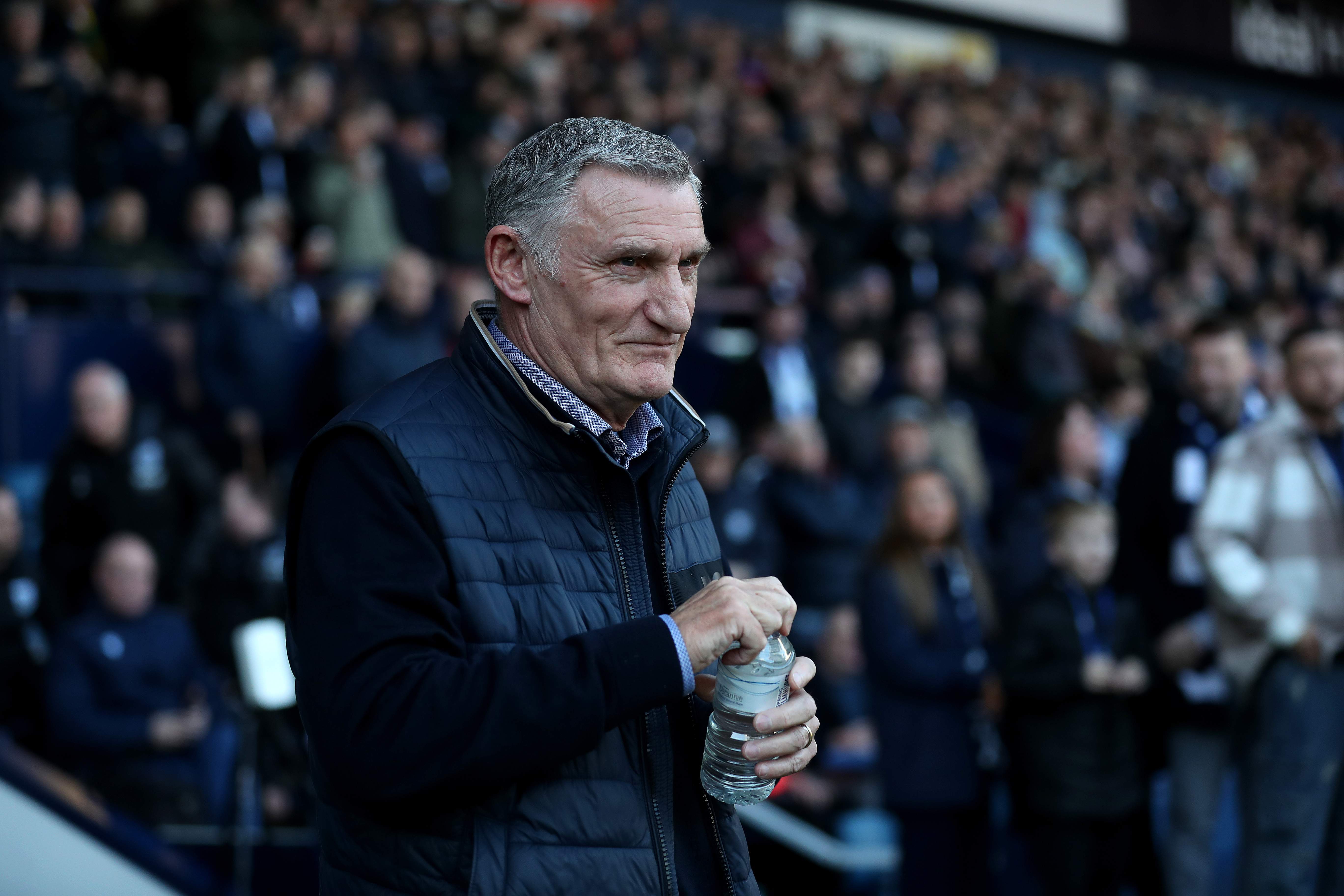 Tony Mowbray on the touchline at The Hawthorns with a bottle of water