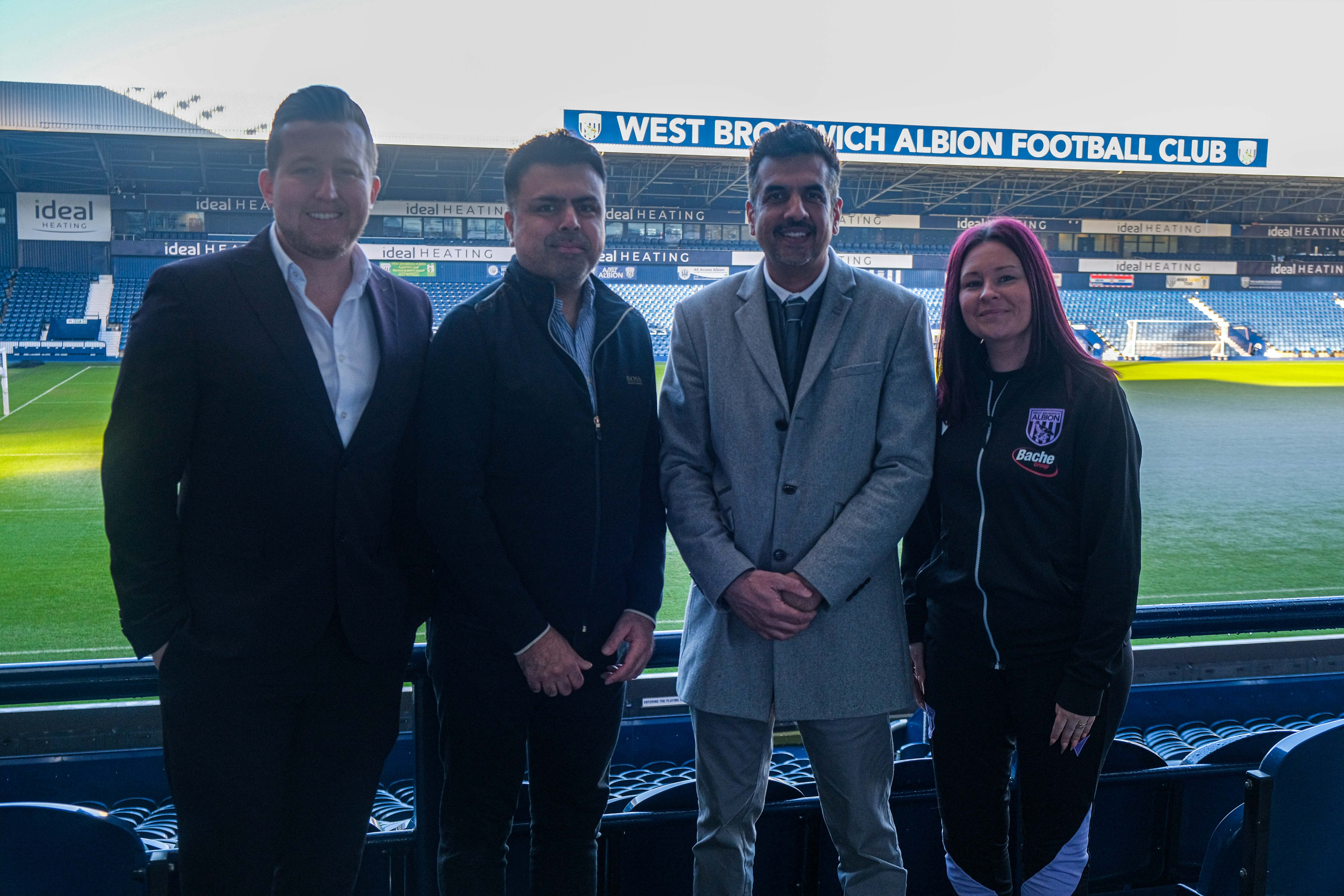 Members of staff from Mahirs Experience and The Albion Foundation pose for a photo.