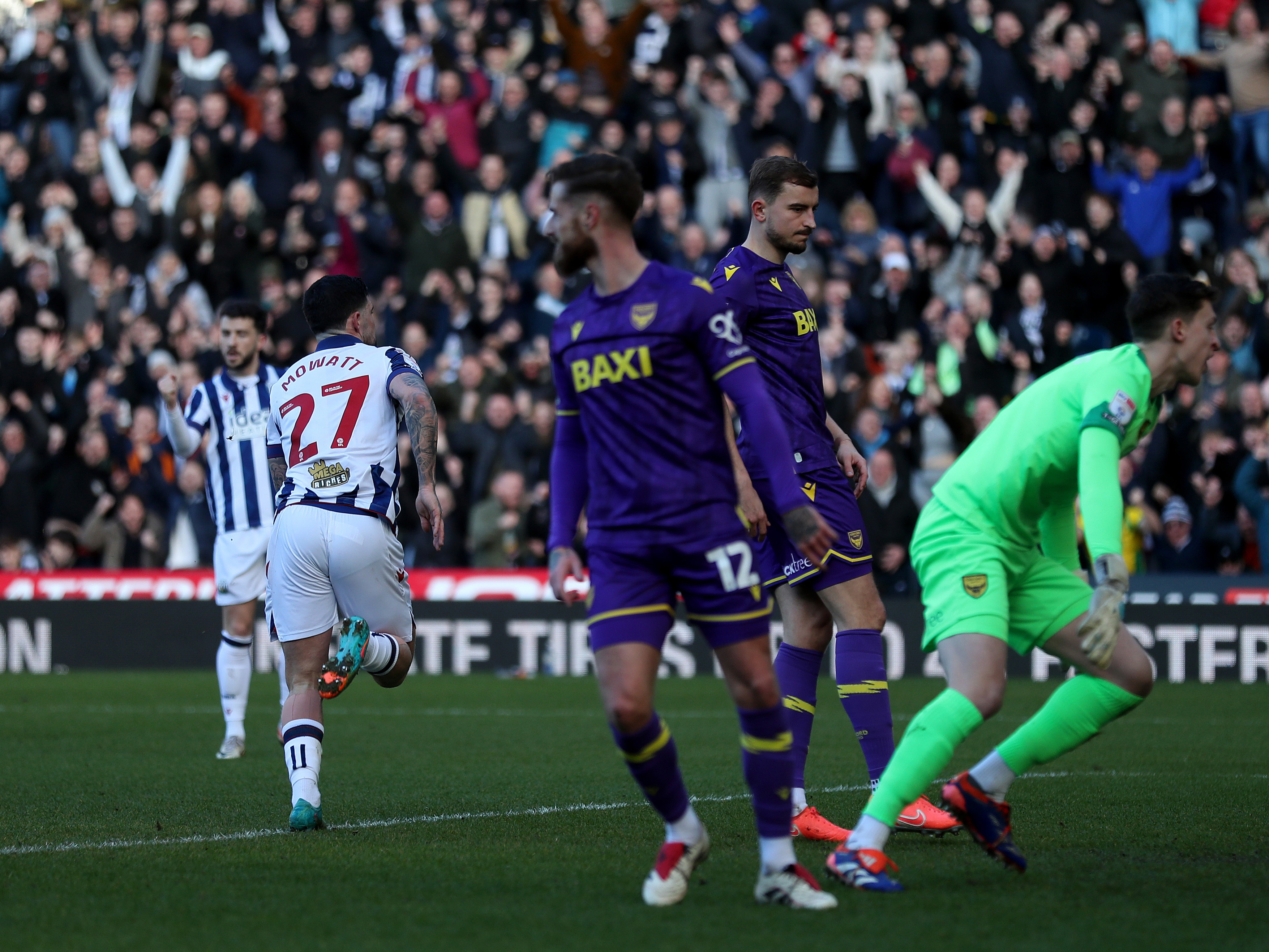 An image of Alex Mowatt celebrating his goal against Oxford