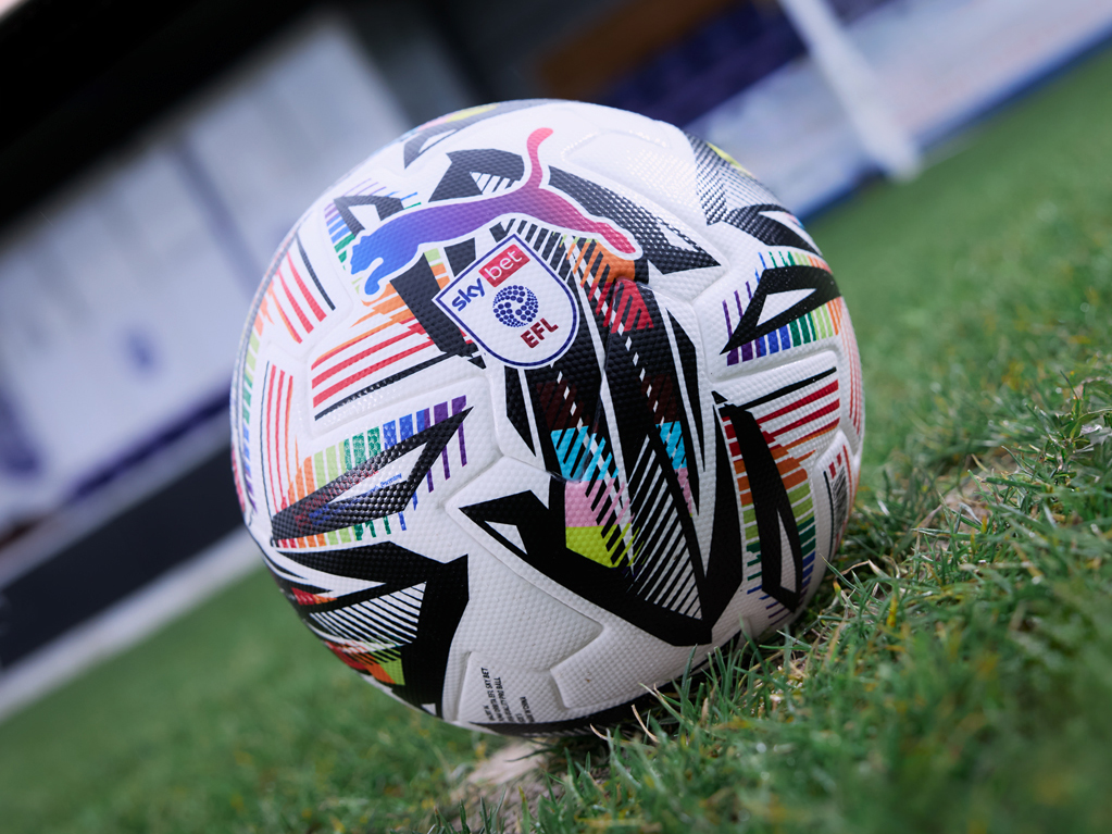 An image of the EFL rainbow ball on a pitch