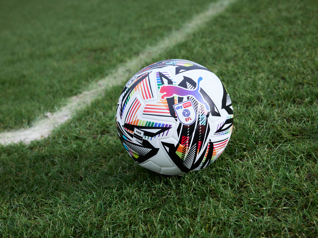 An image of the EFL rainbow ball on a pitch