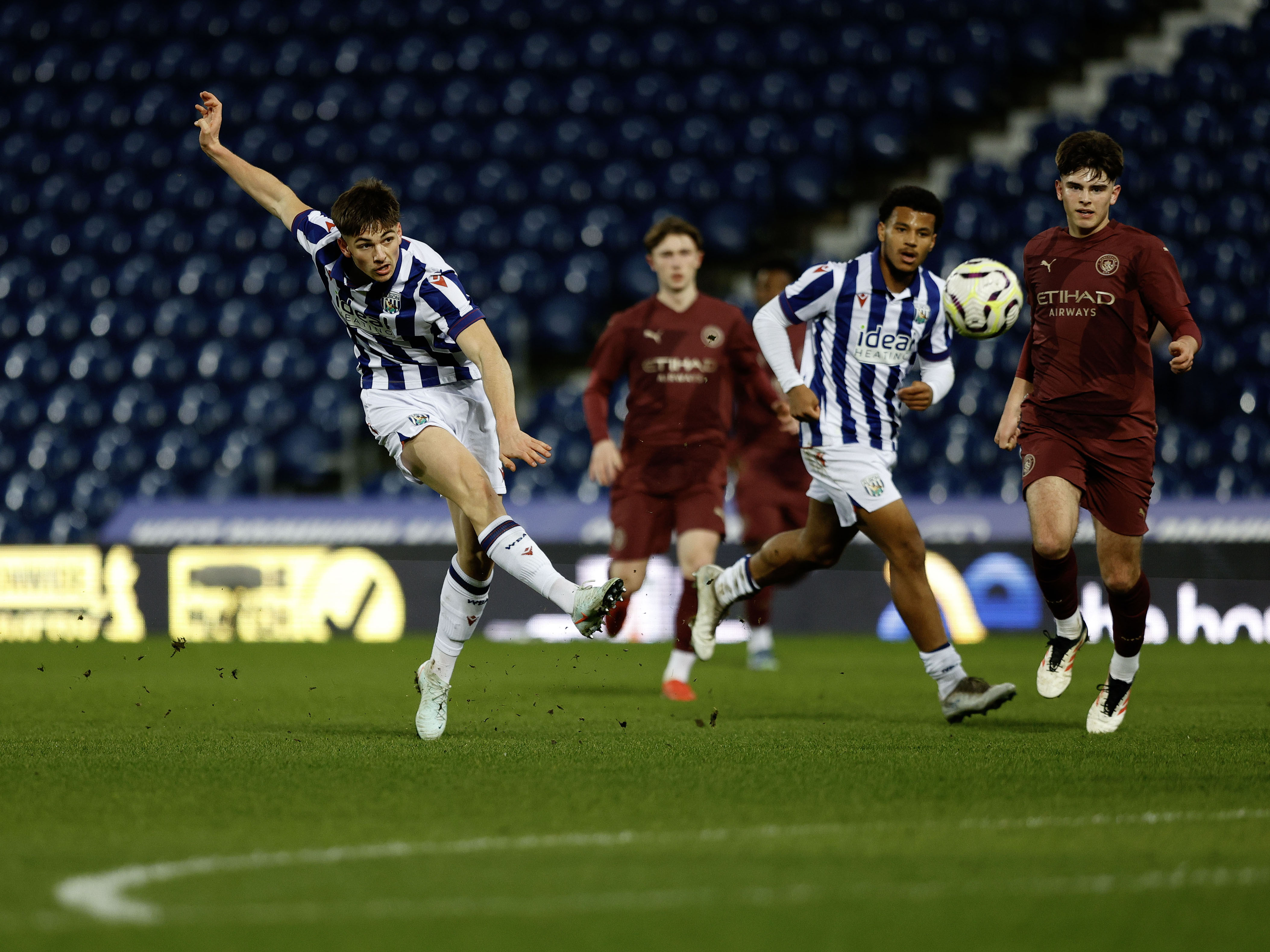 A photo of Albion U18 midfielder Charlie Blackshields in the 2024/25 home kit