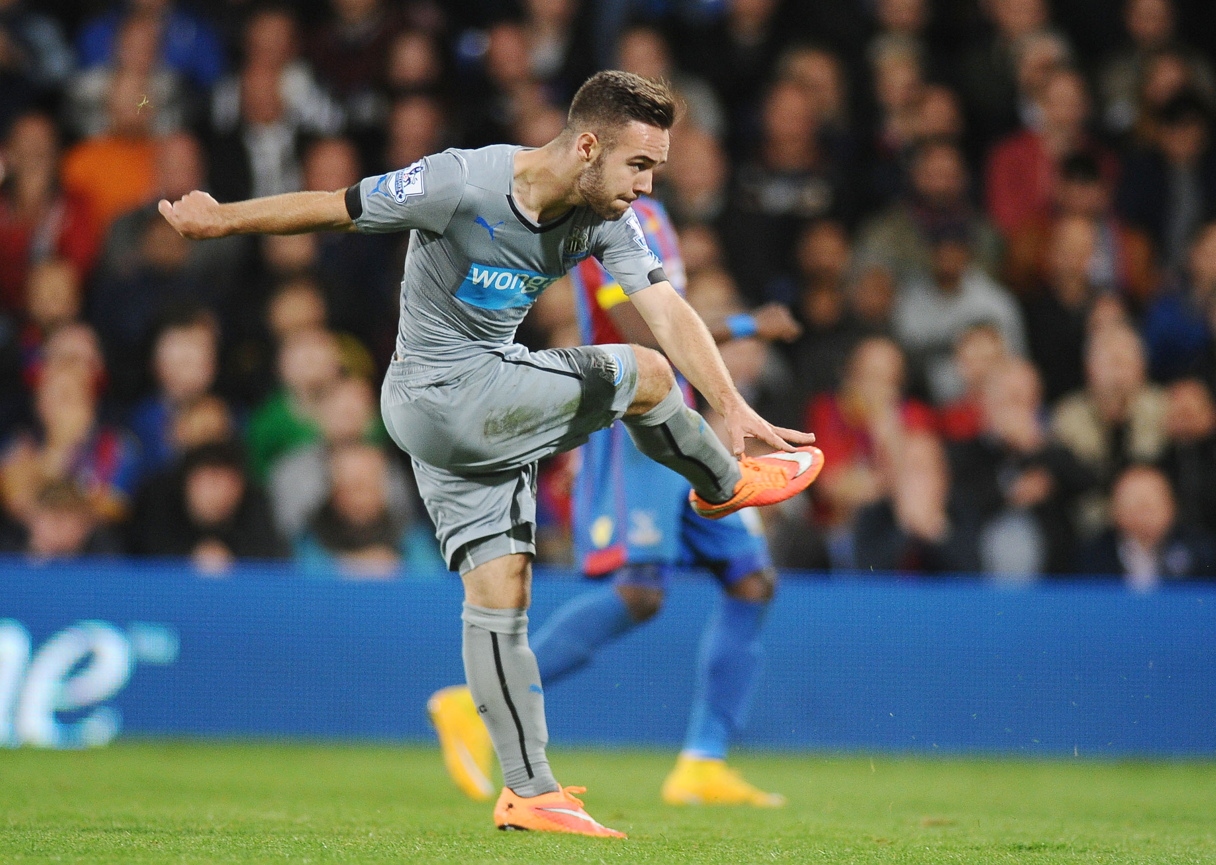 Adam Armstrong in action for Newcastle United in 2014