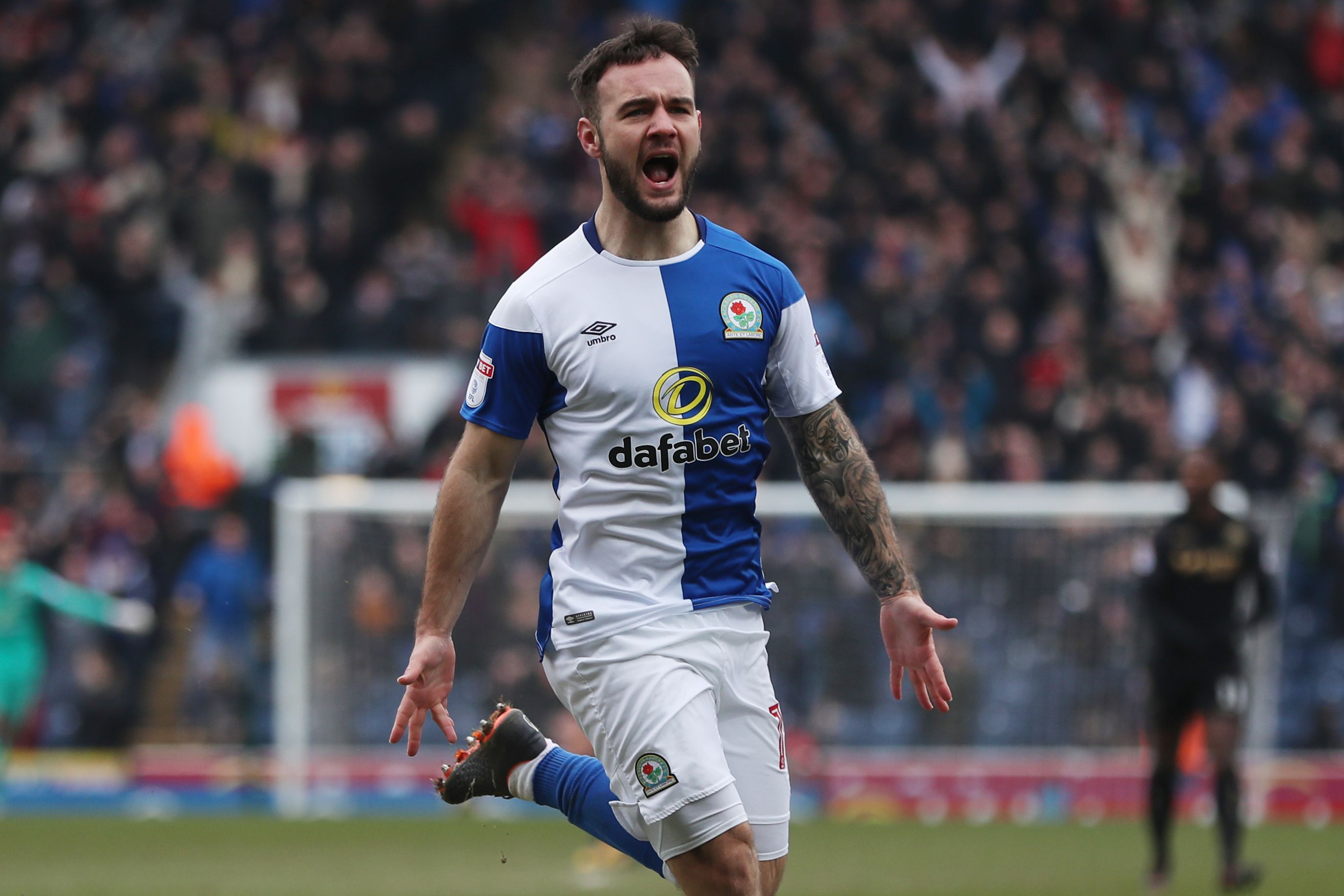 Adam Armstrong celebrates scoring a goal for Blackburn in 2018