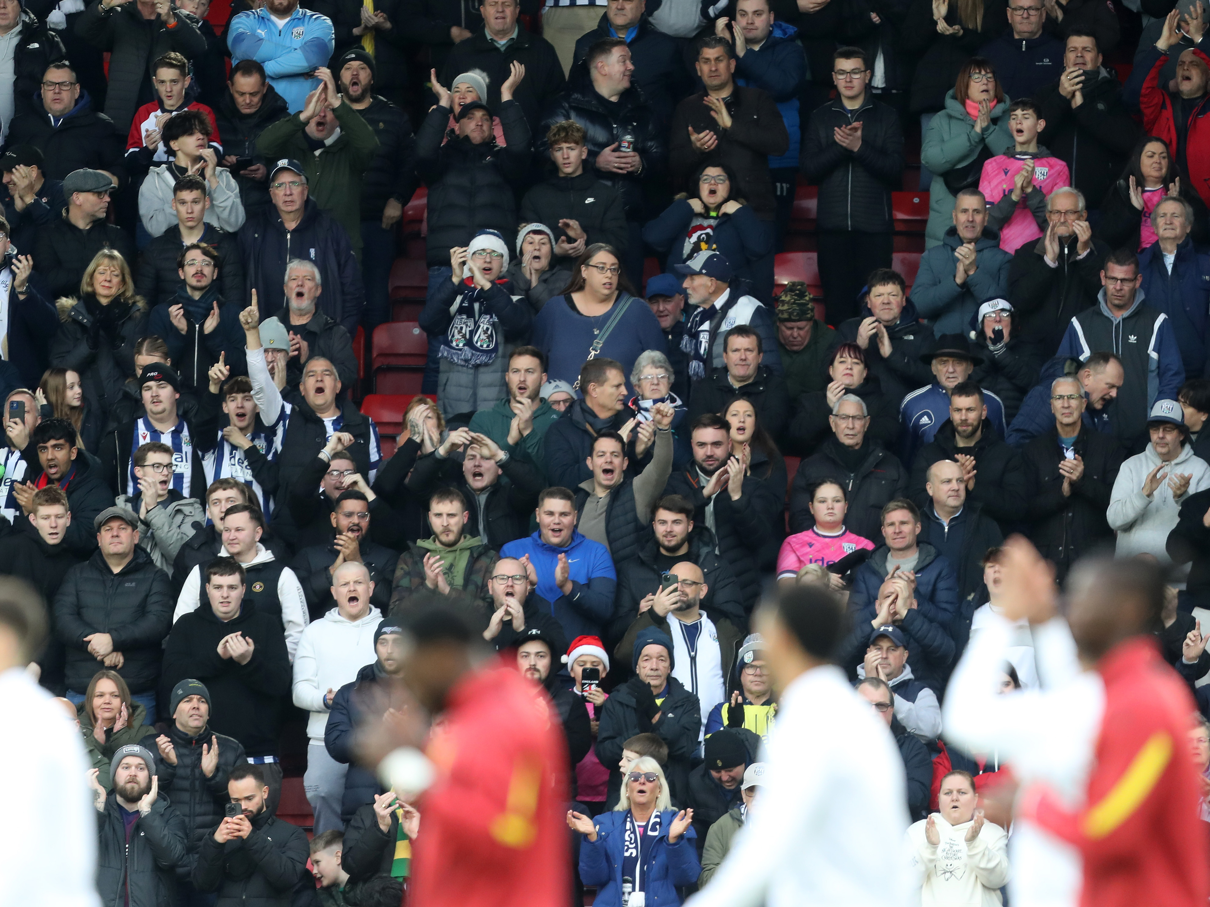 An image of Albion supporters in an away end