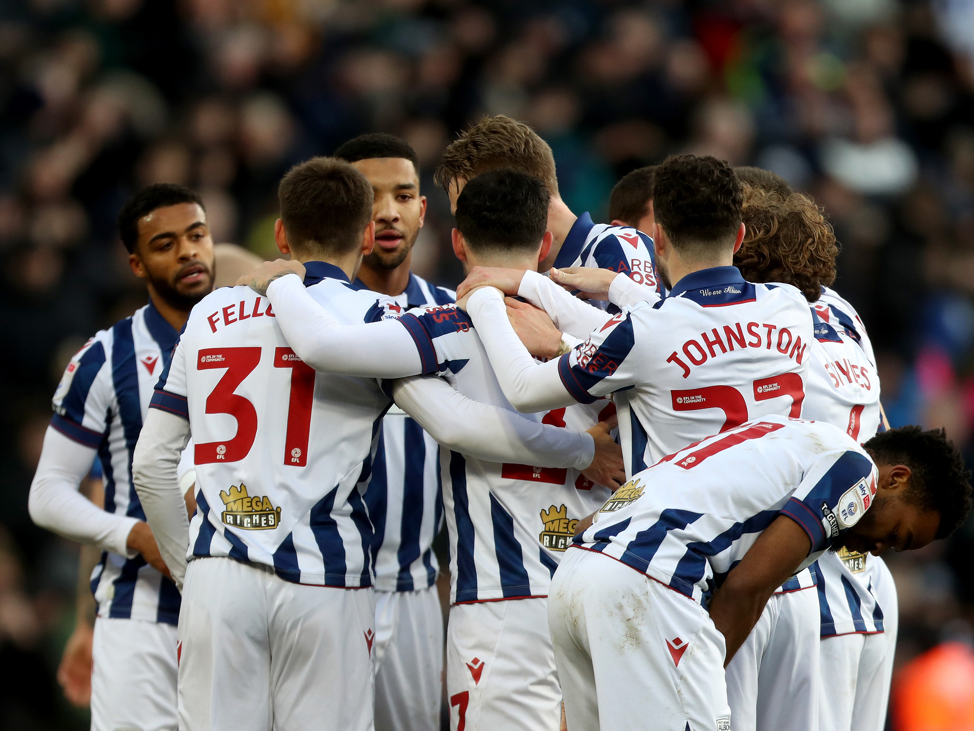 An image of Albion's 2024/25 team celebrating a goal together