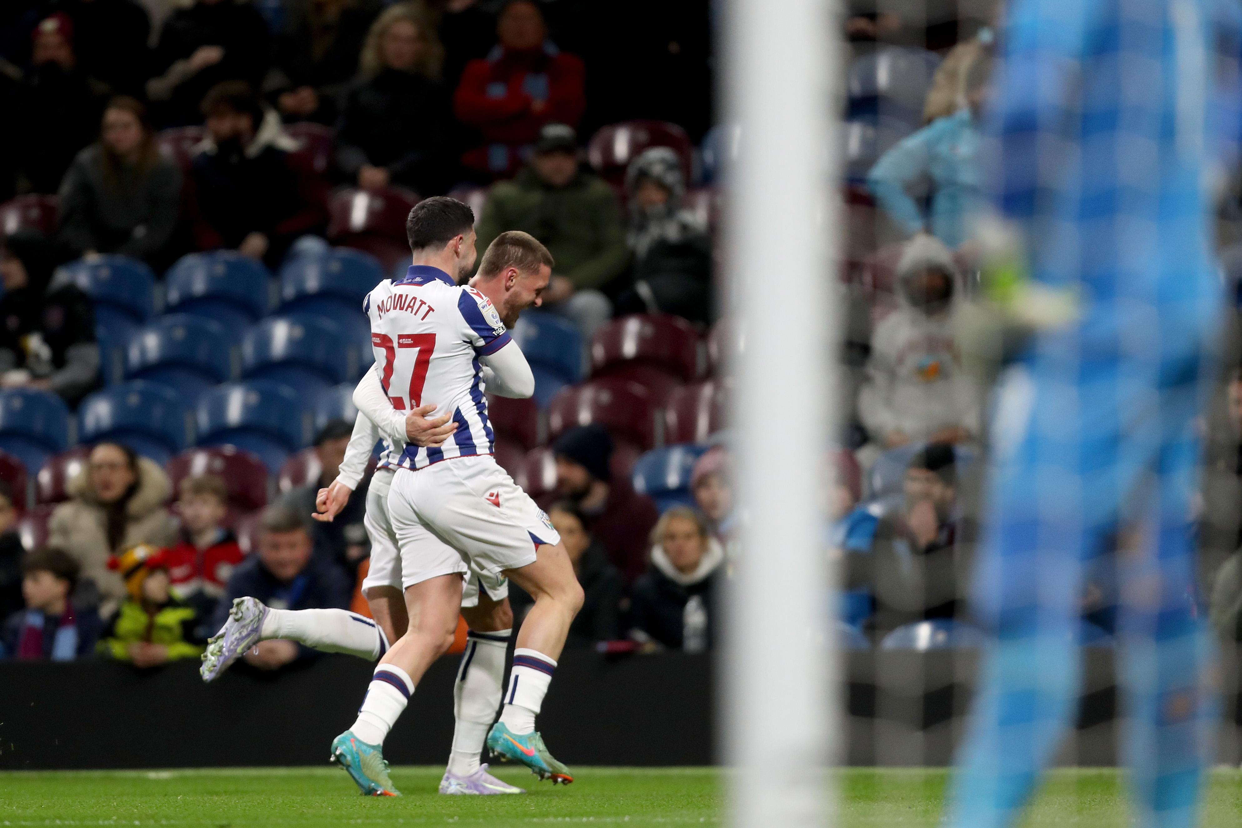 John Swift celebrates scoring a free-kick at Burnley