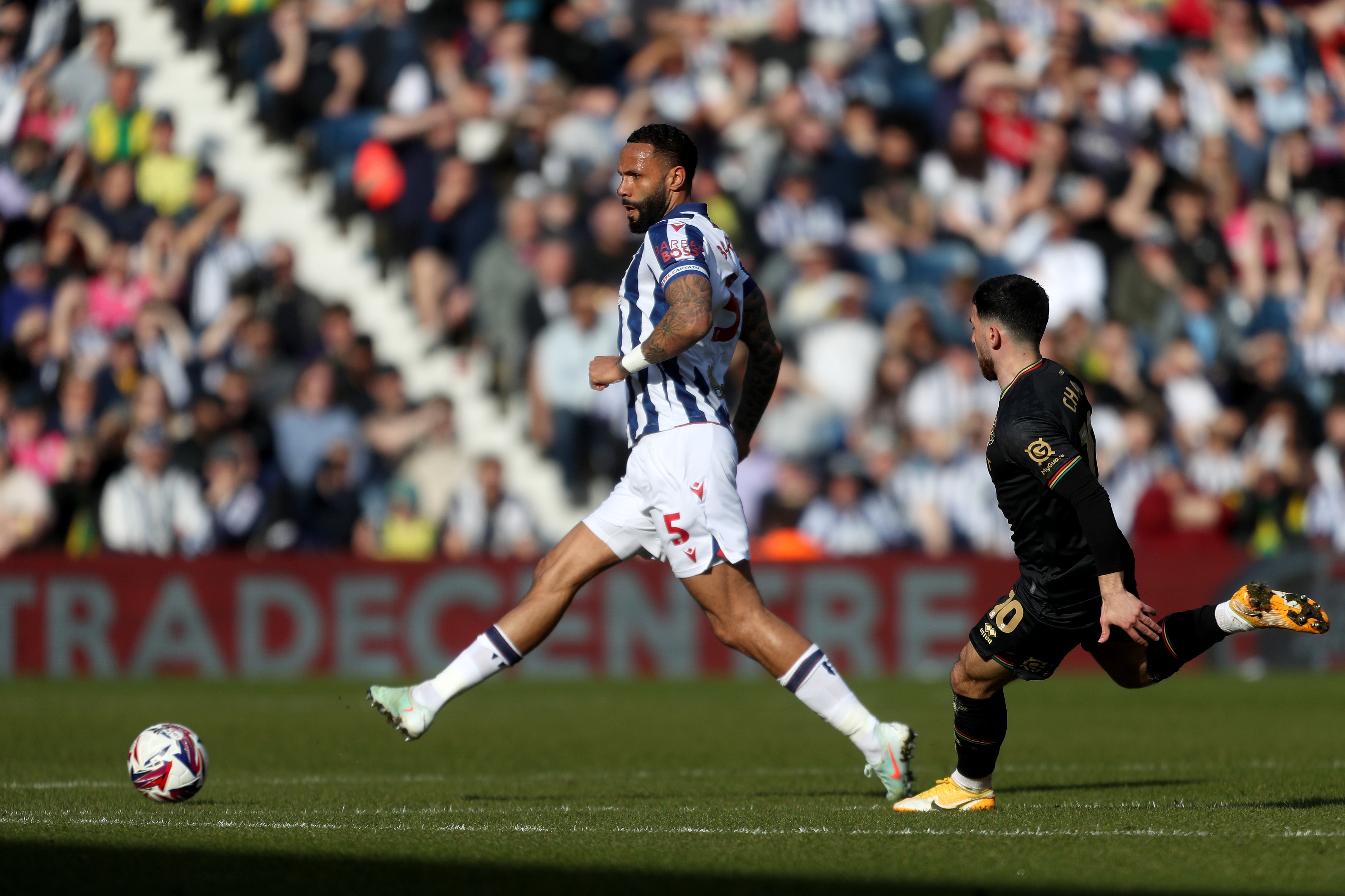 Kyle Bartley passing the ball against QPR 