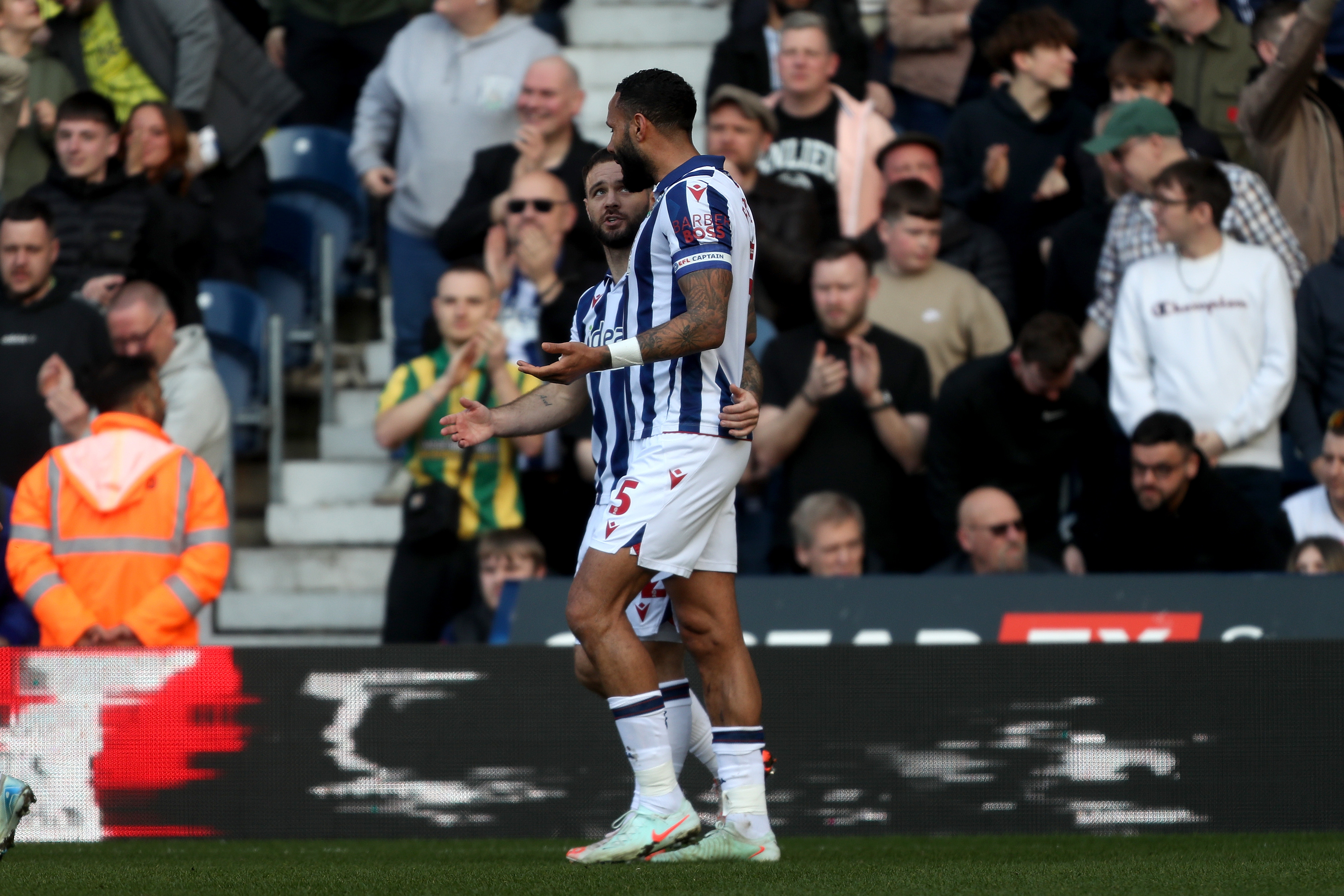 Adam Armstrong celebrates with Kyle Bartley after scoring against QPR 