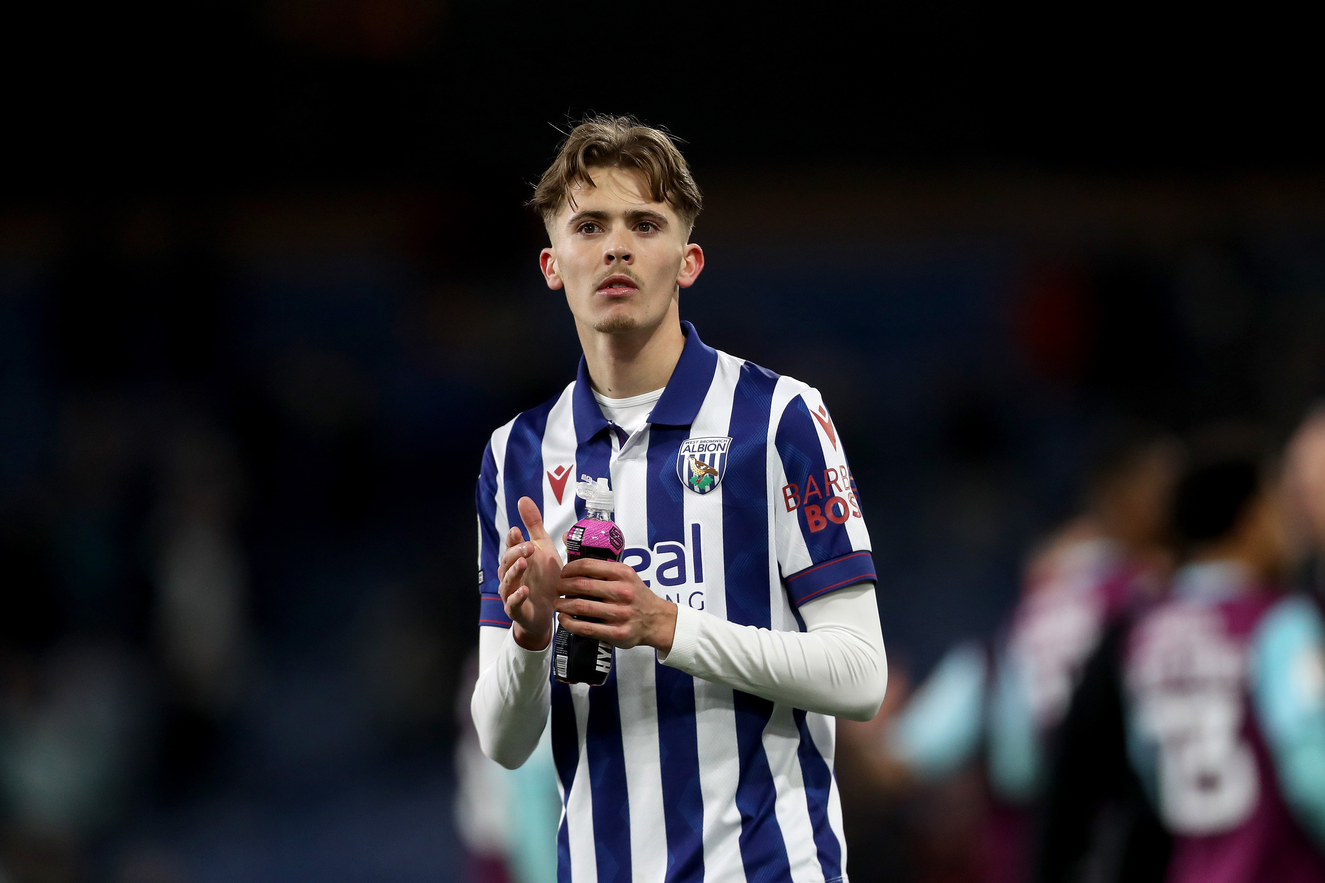 Isaac Price applauding Albion fans after the game at Burnley