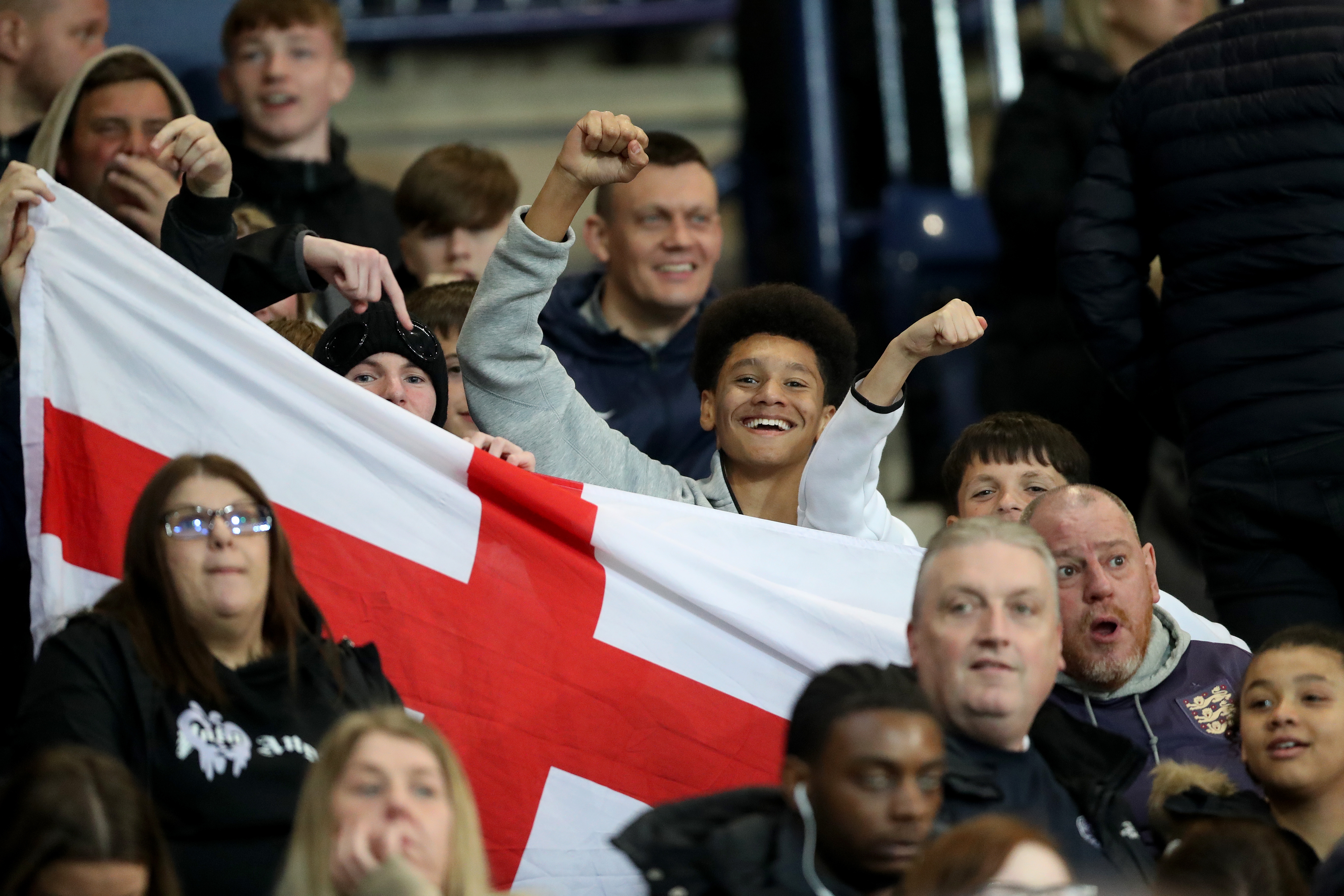 England fans in the stands at The Hawthorns with England flags