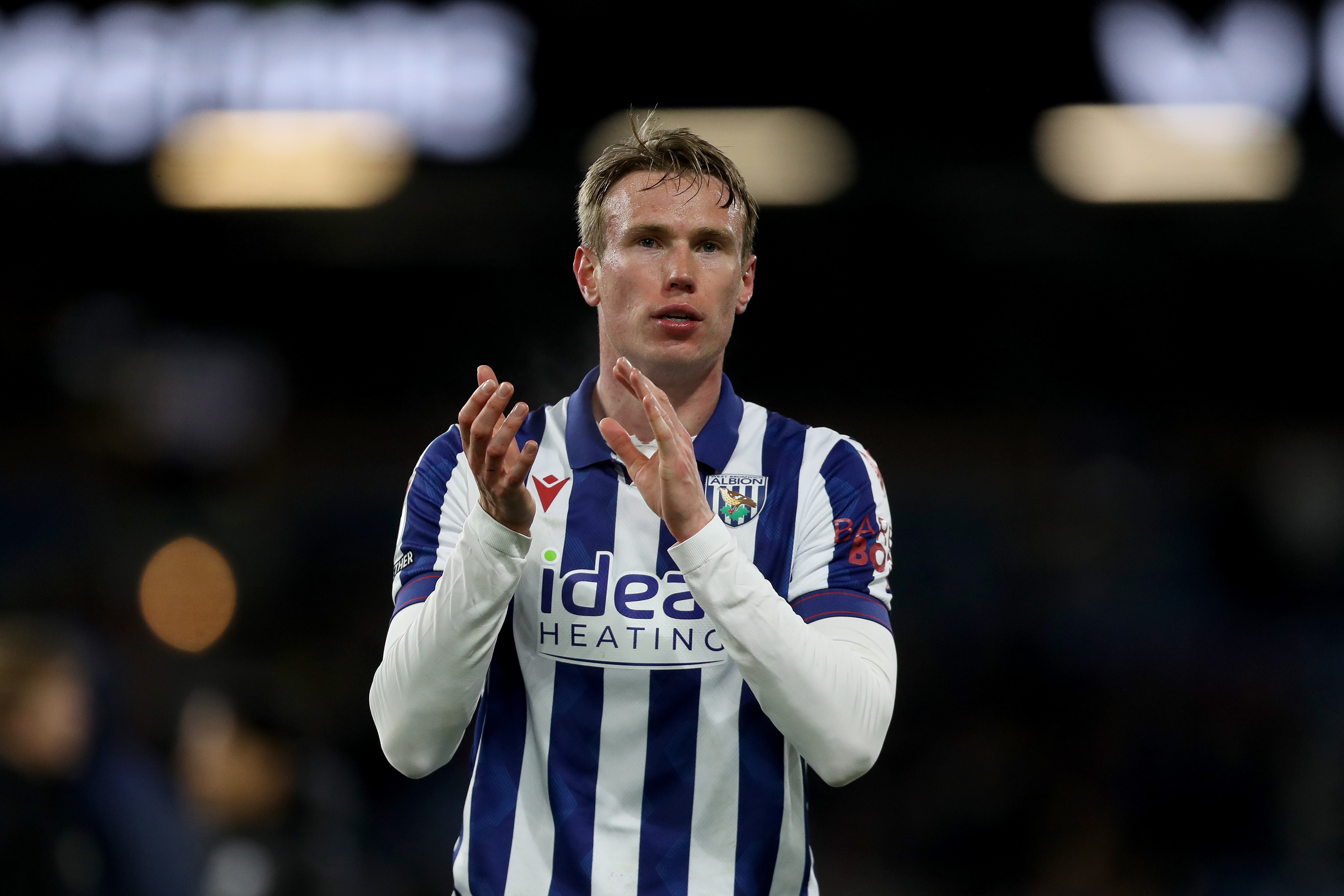 Torbjørn Heggem applauding Albion fans after the game at Burnley