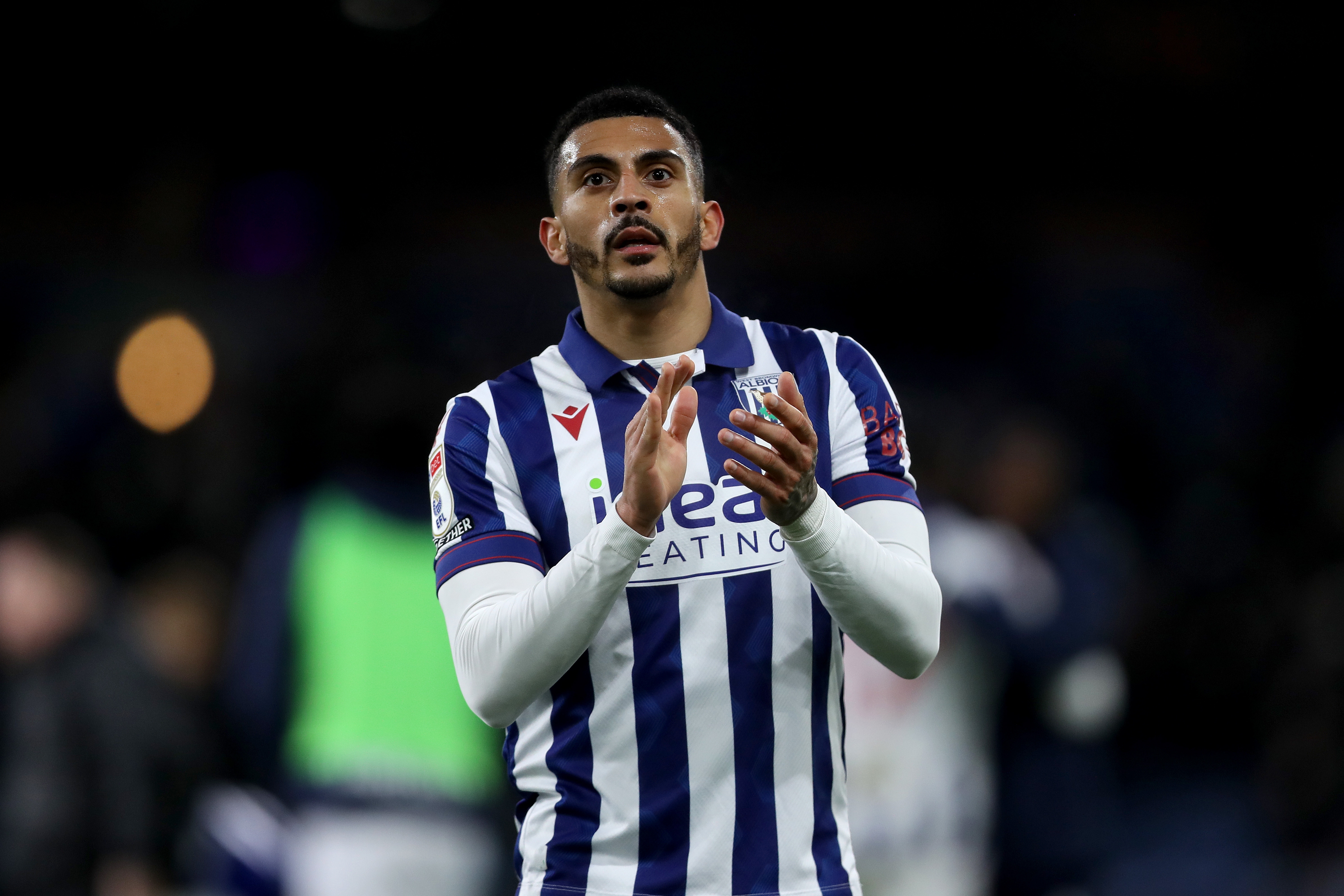 Karlan Grant applauding Albion fans after the game at Burnley