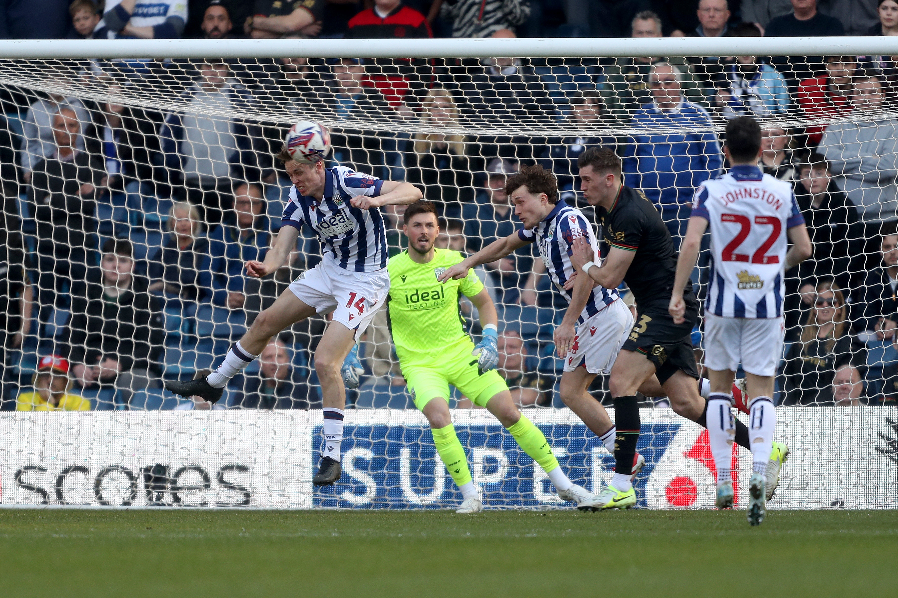 Torbjørn Heggem heading the ball clear against QPR 