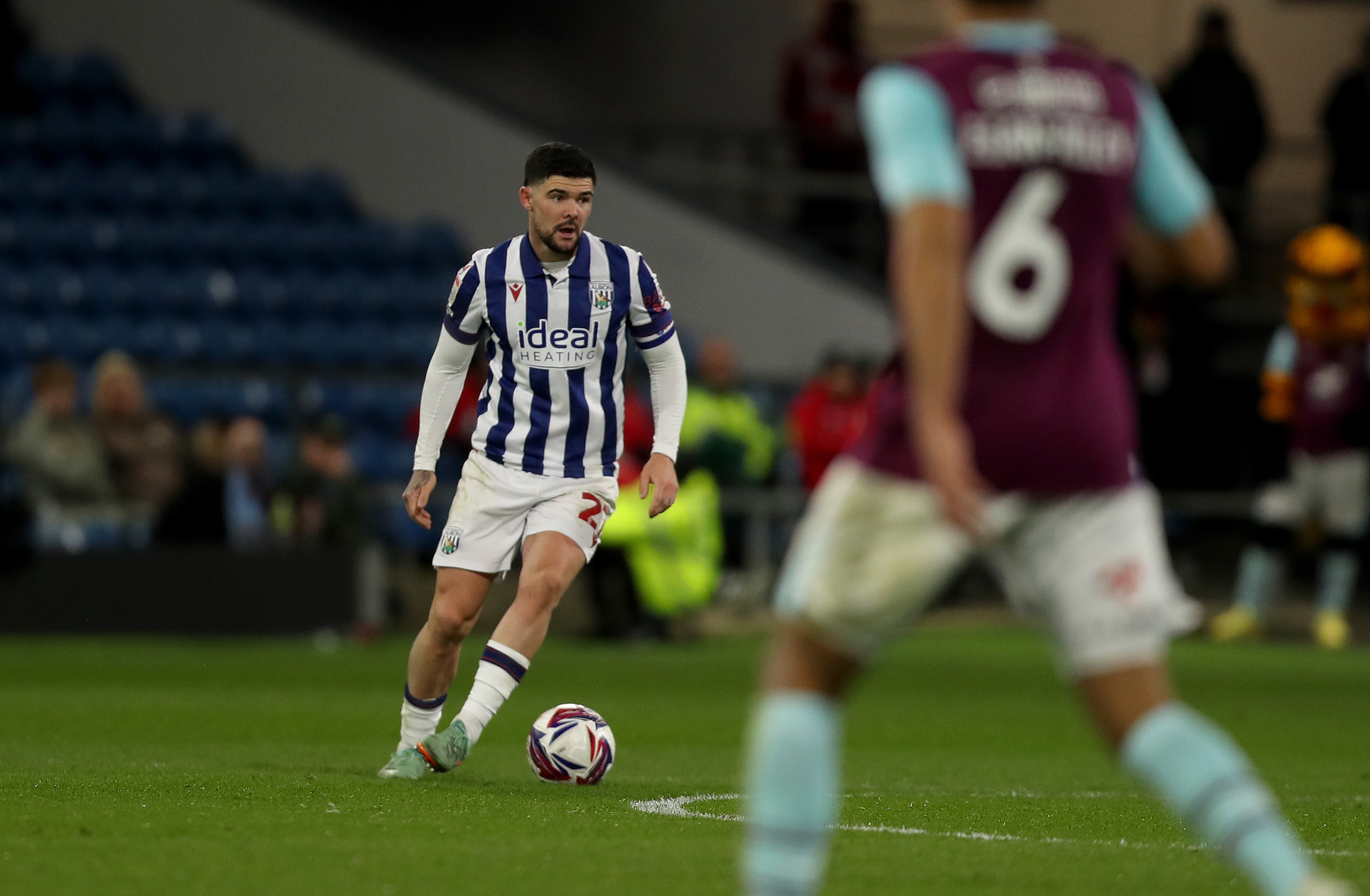 Alex Mowatt in action against Burnley 