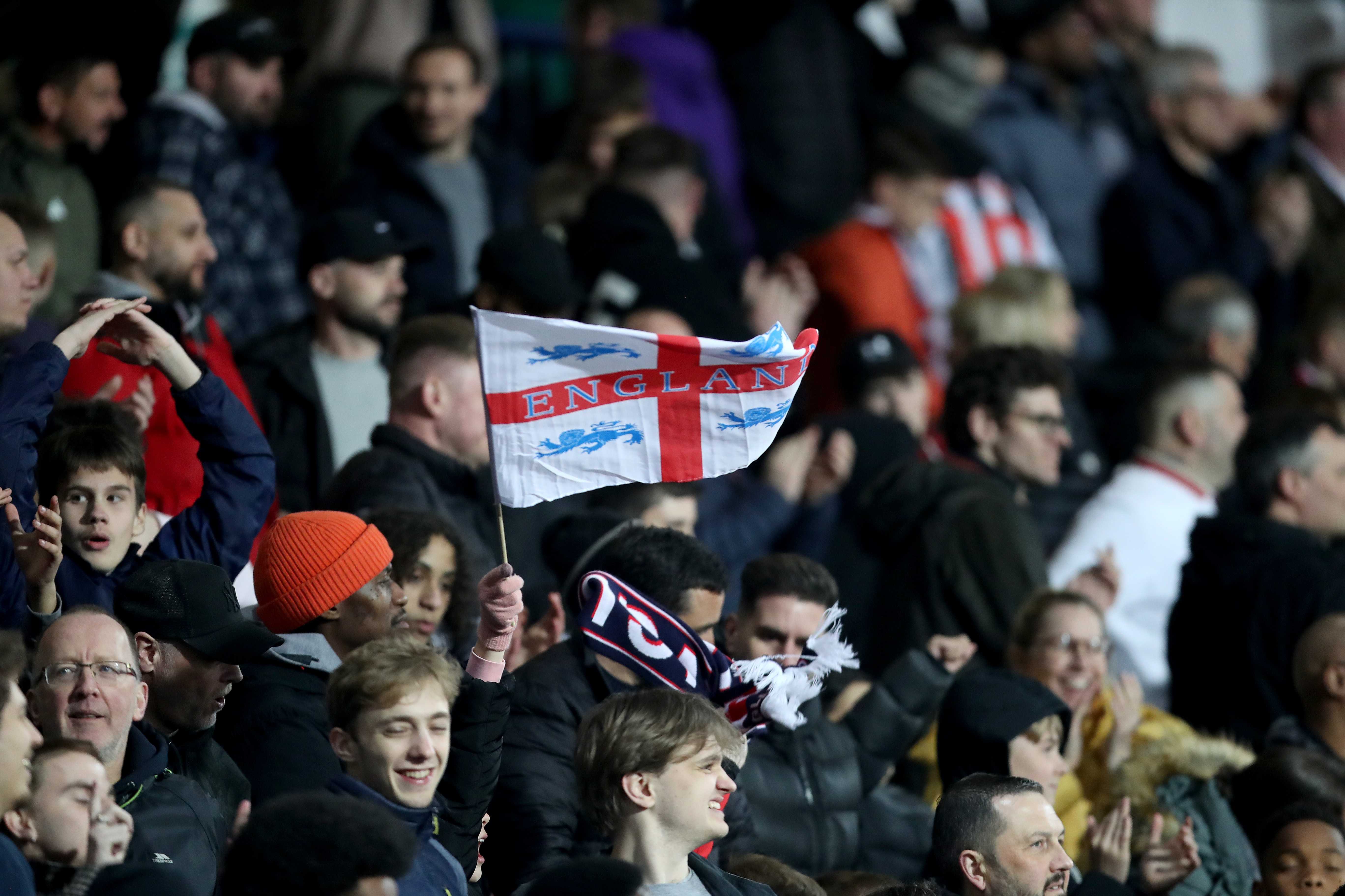 England fans in the stands at The Hawthorns with England flags