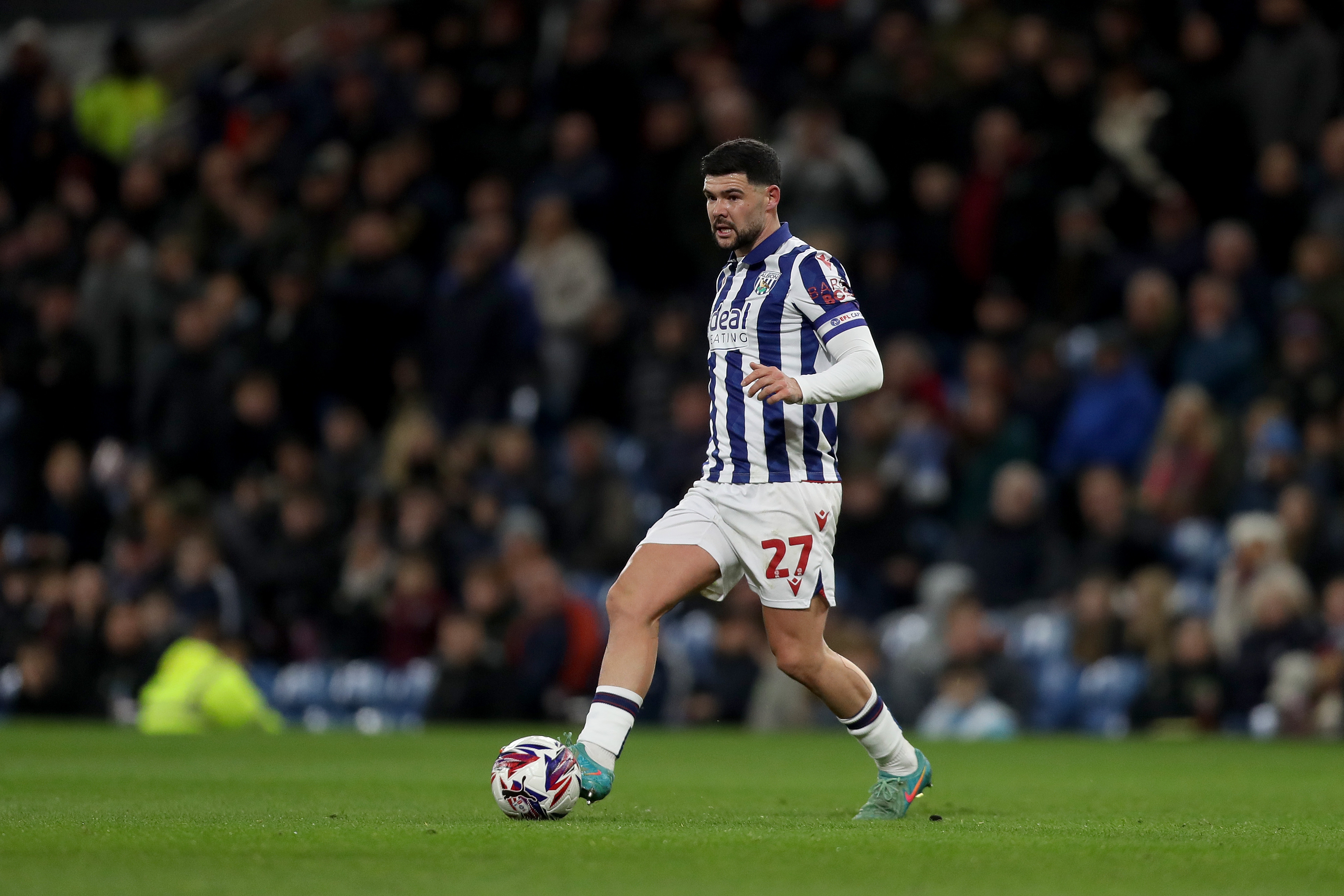 Alex Mowatt in action against Burnley 