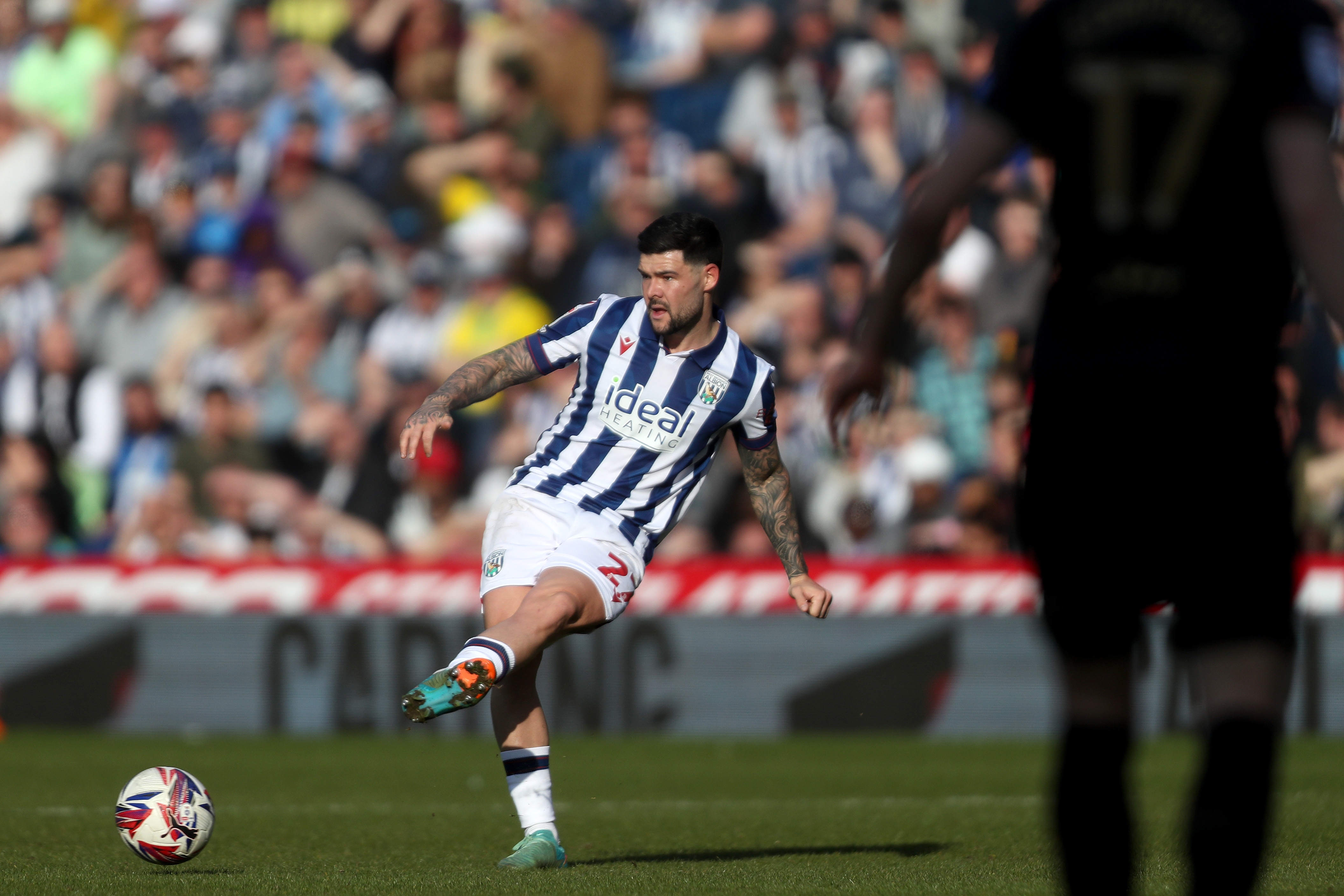 Alex Mowatt passing the ball against QPR 