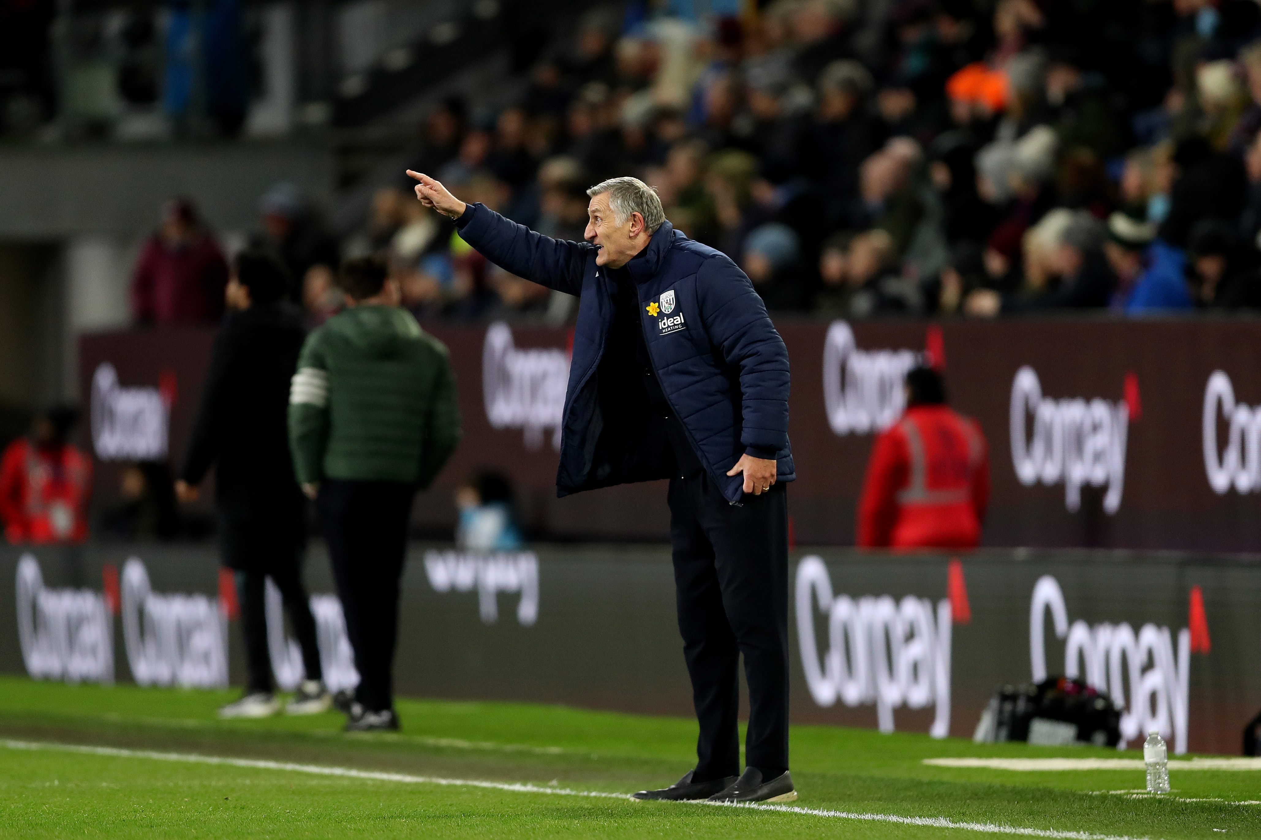 Tony Mowbray pointing on the side of the pitch at Turf Moor