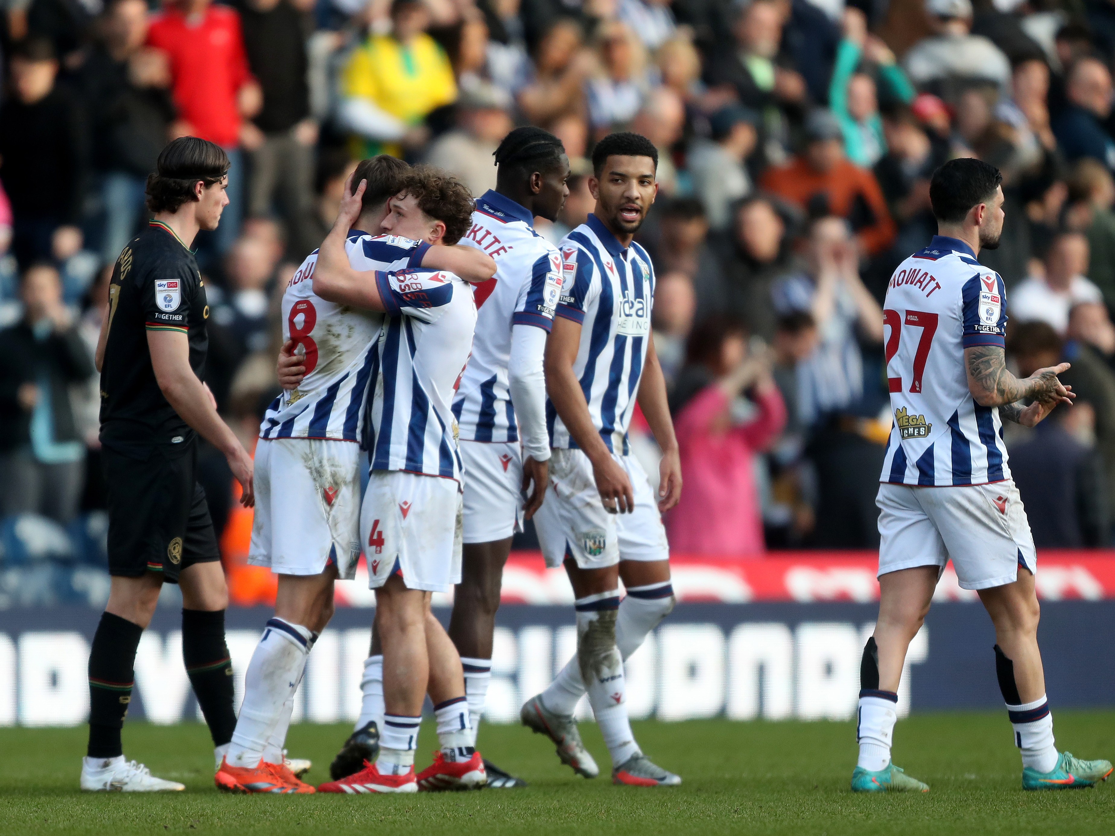 Albion players celebrate at full time after beating QPR at The Hawthorns 