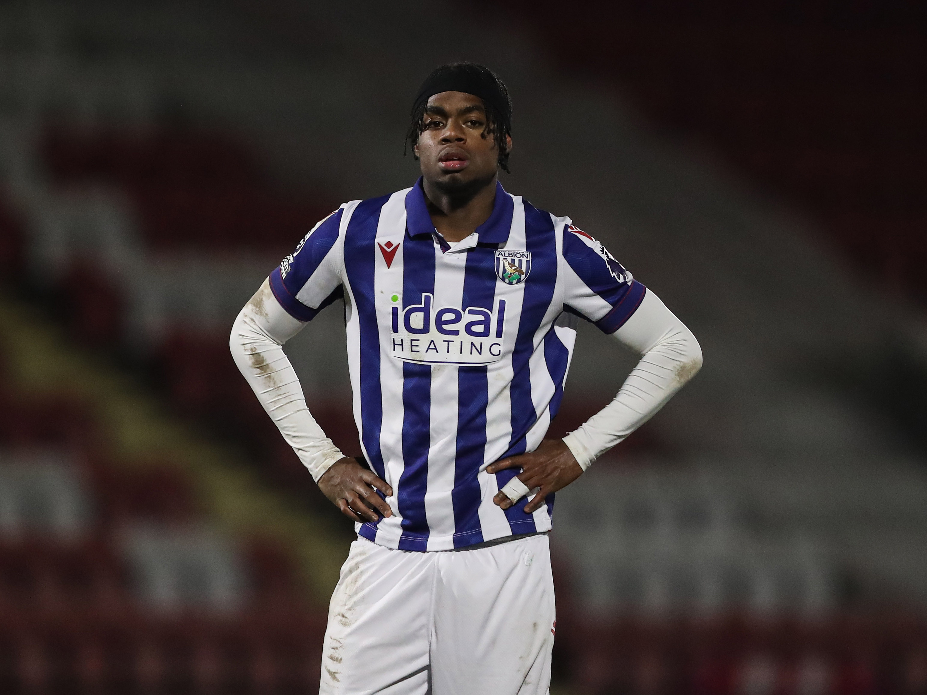 A photo of Albion u21 winger Akeel Higgins in the 2024/25 home kit