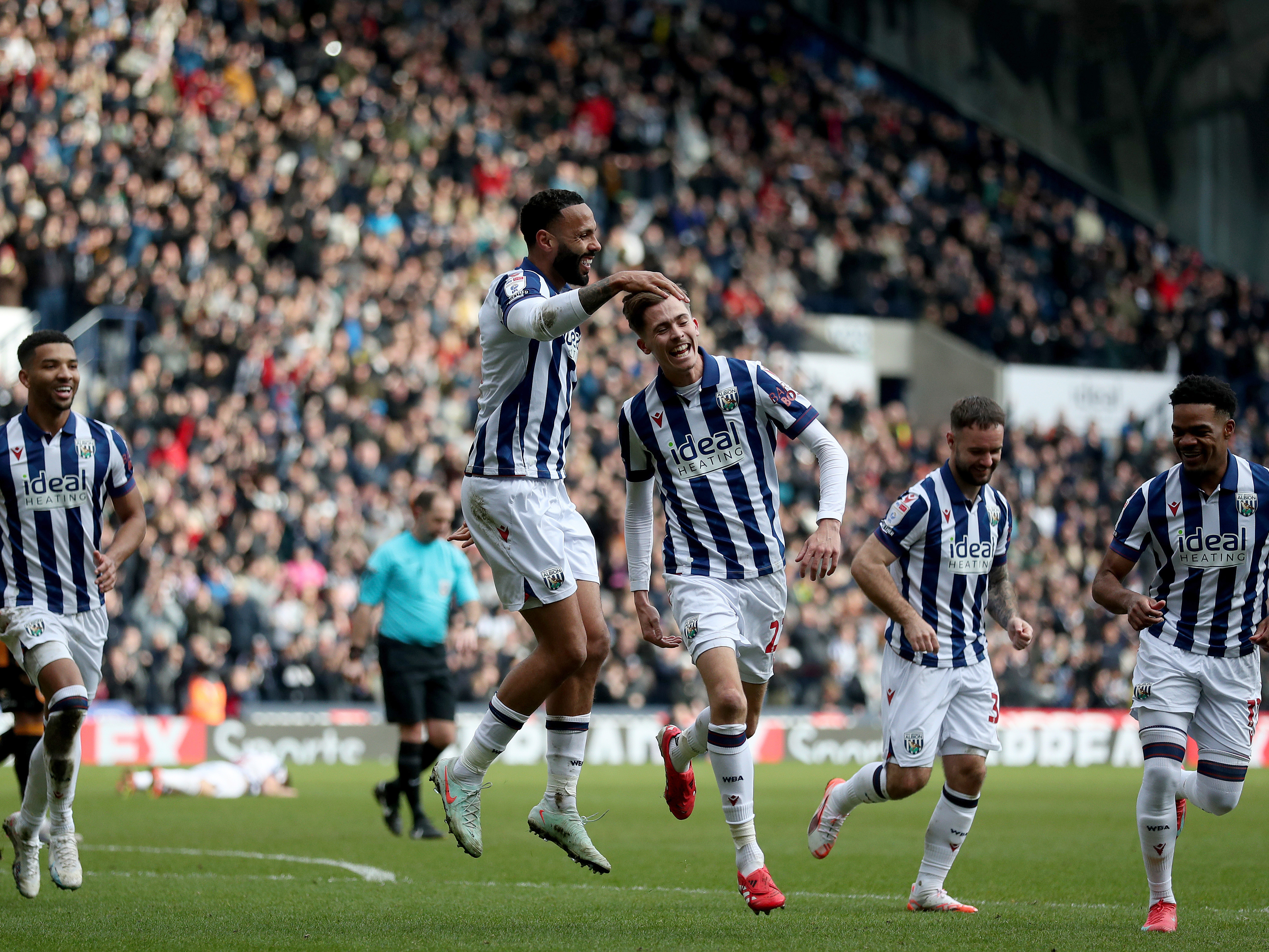 An image of Kyle Bartley celebrating with Isaac Price after his goal against Hull