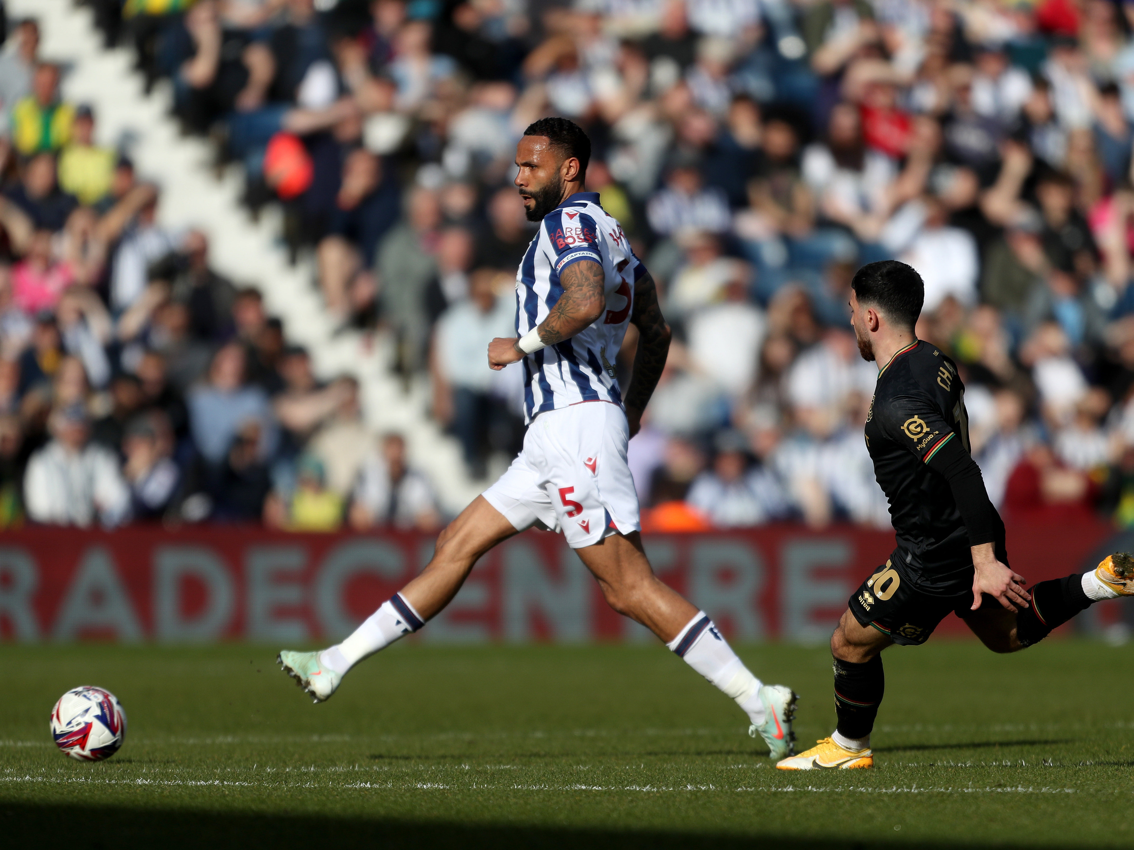 An image of Kyle Bartley passing the ball against QPR