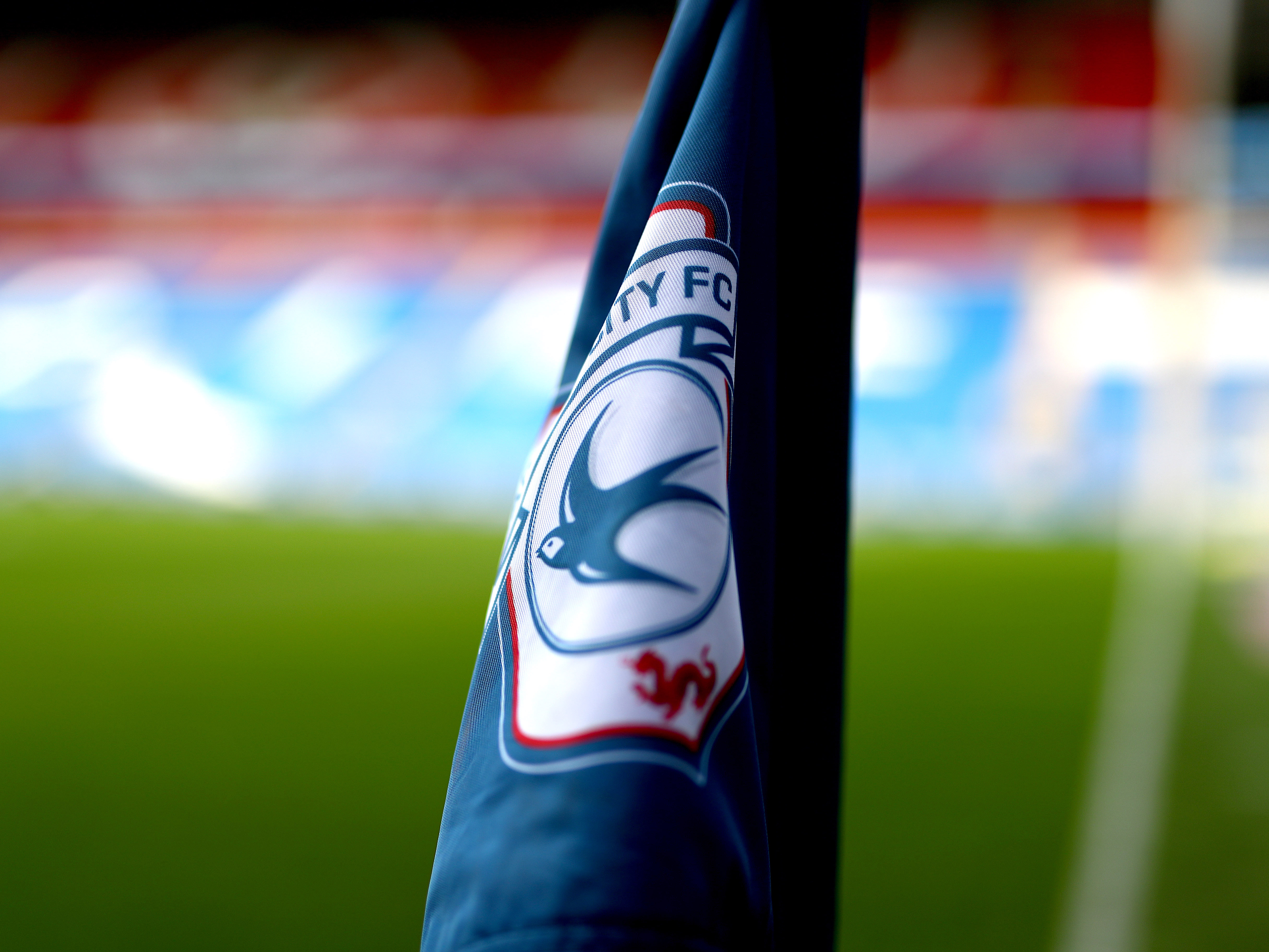 A photo of a Cardiff City badge on a corner flag at the CCS