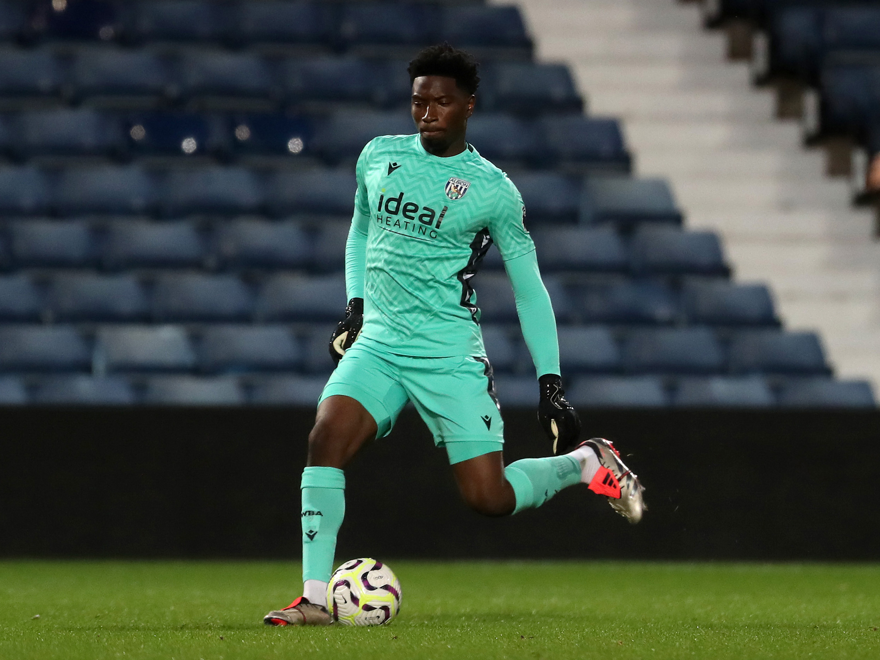 A photo of Albion U21 goalkeeper Ben Cisse in the 2024/25 green keeper kit