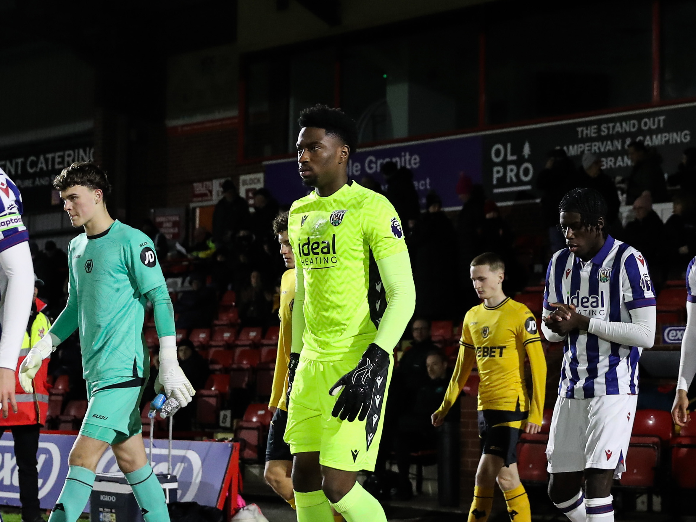 A photo of Albion U21 goalkeeper Ben Cisse in the yellow 2024/25 keeper kit