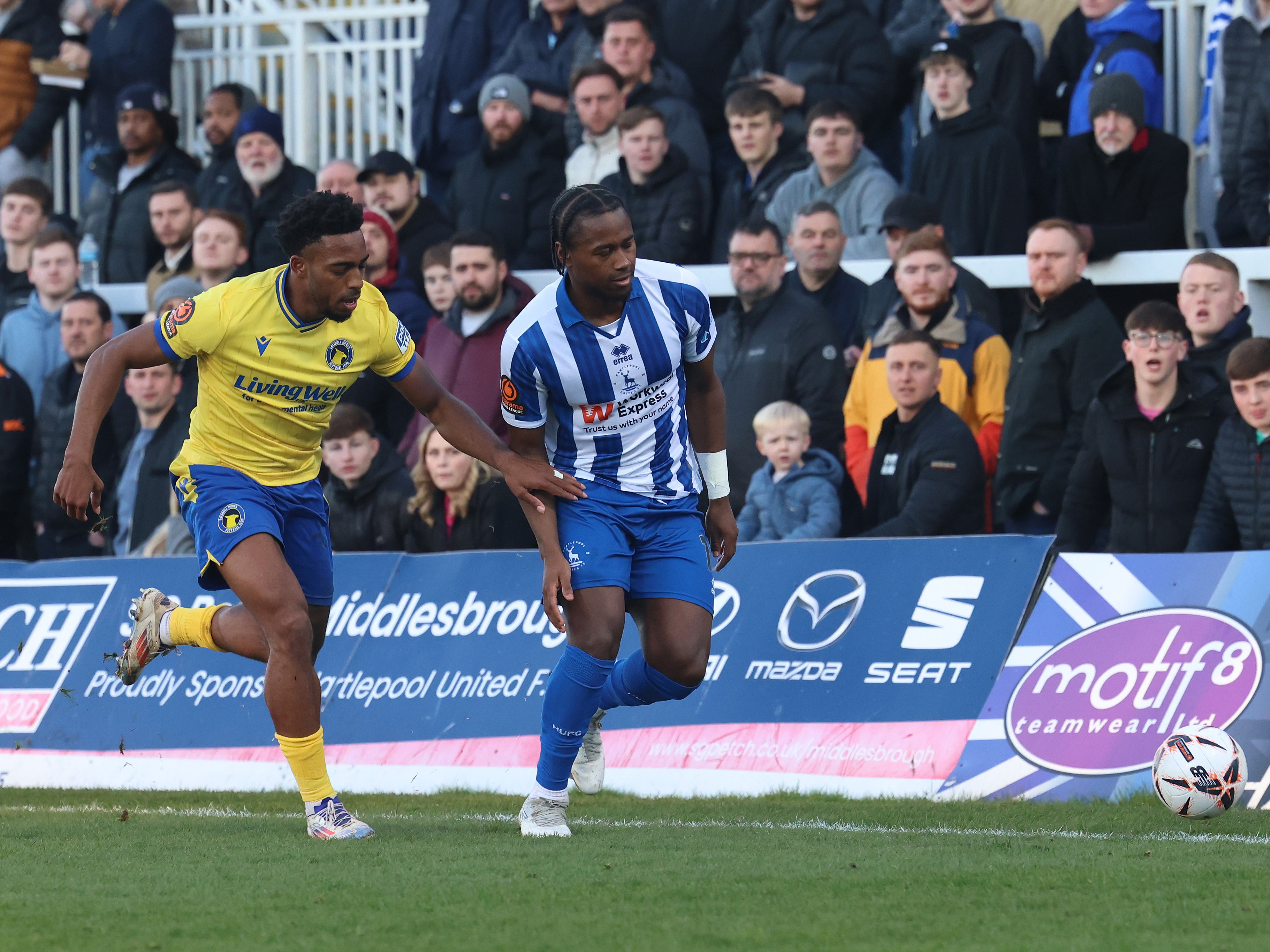 A photo of Reyes Cleary in action for loan club Hartlepool, wearing their blue and white striped home kit