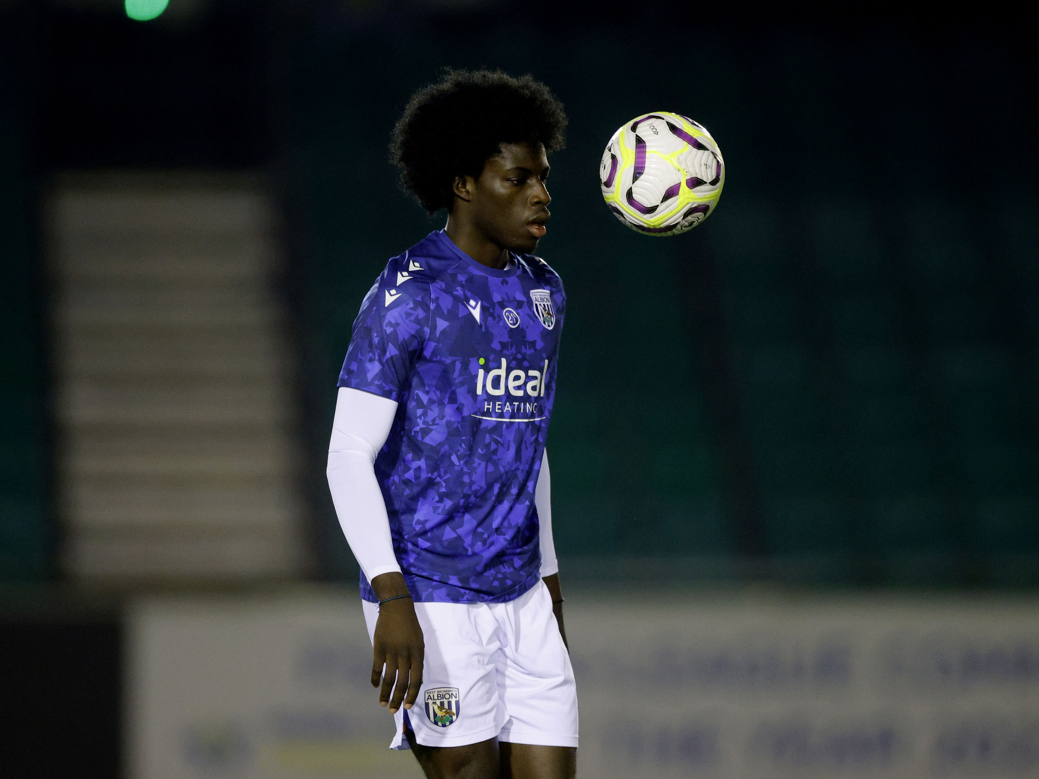 A photo of U21 defender Mo Diomande warming up before a PL2 game