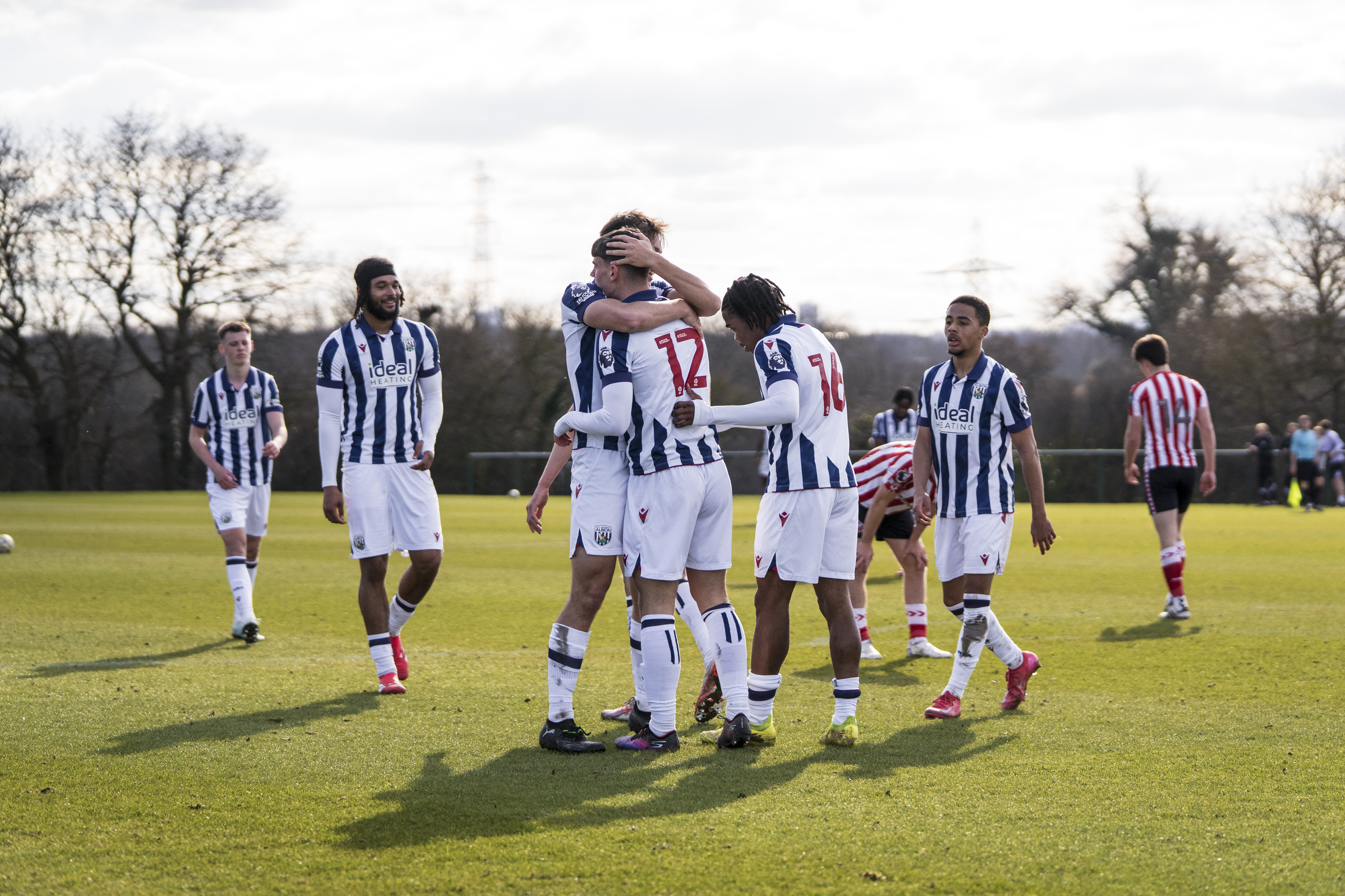 Albion's youngsters celebrate.