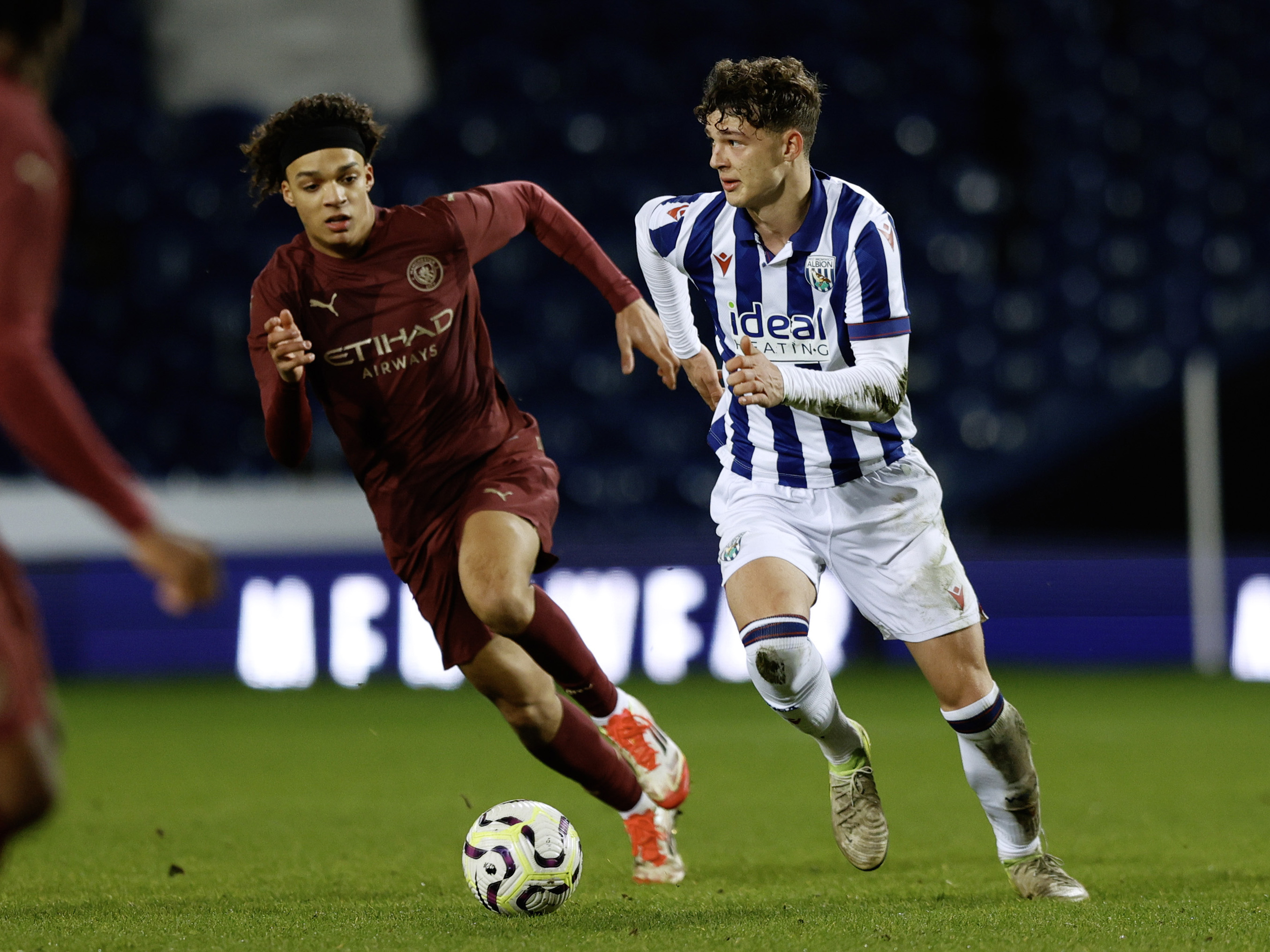 A photo of Albion U18 defender Noah Dupont in the 2024/25 home kit