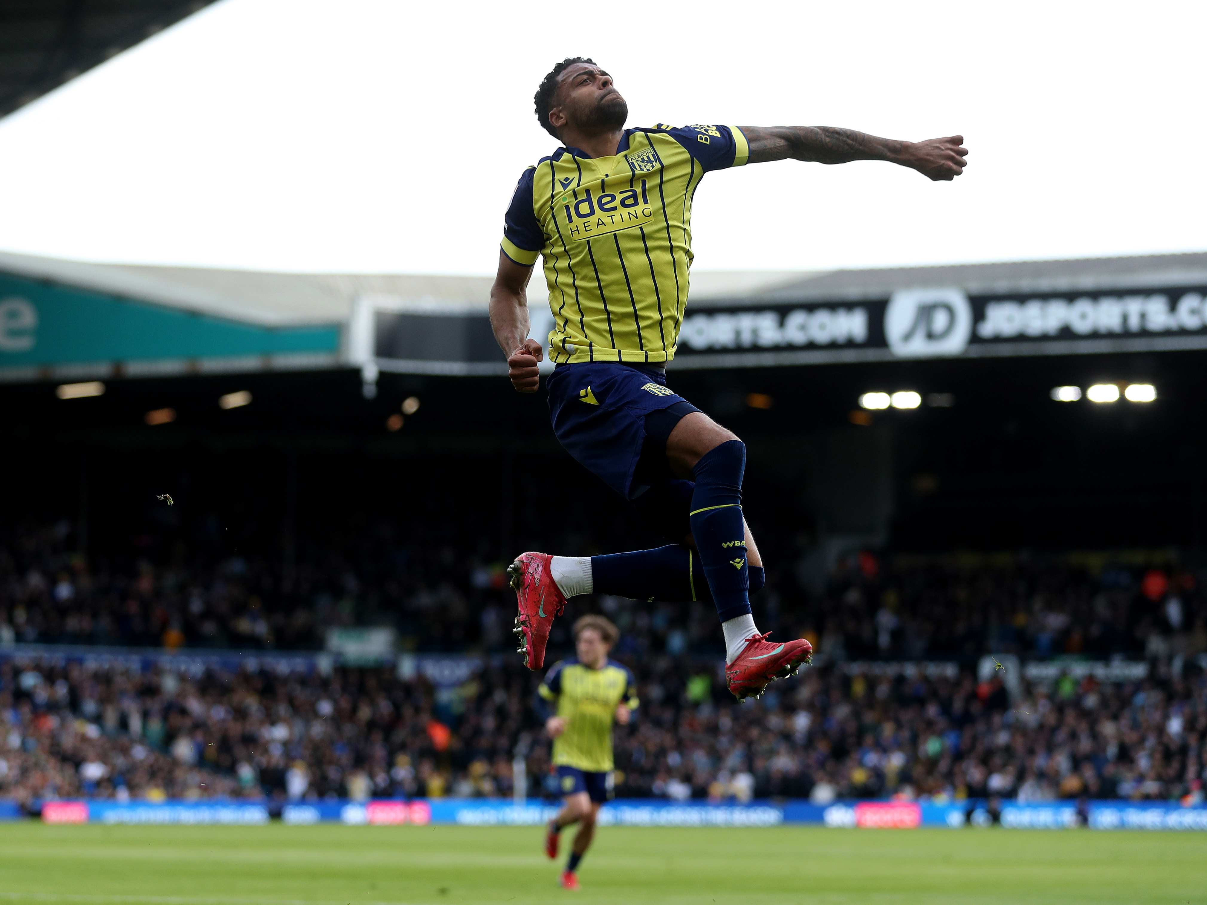 An image of Darnell Furlong celebrating his goal at Leeds