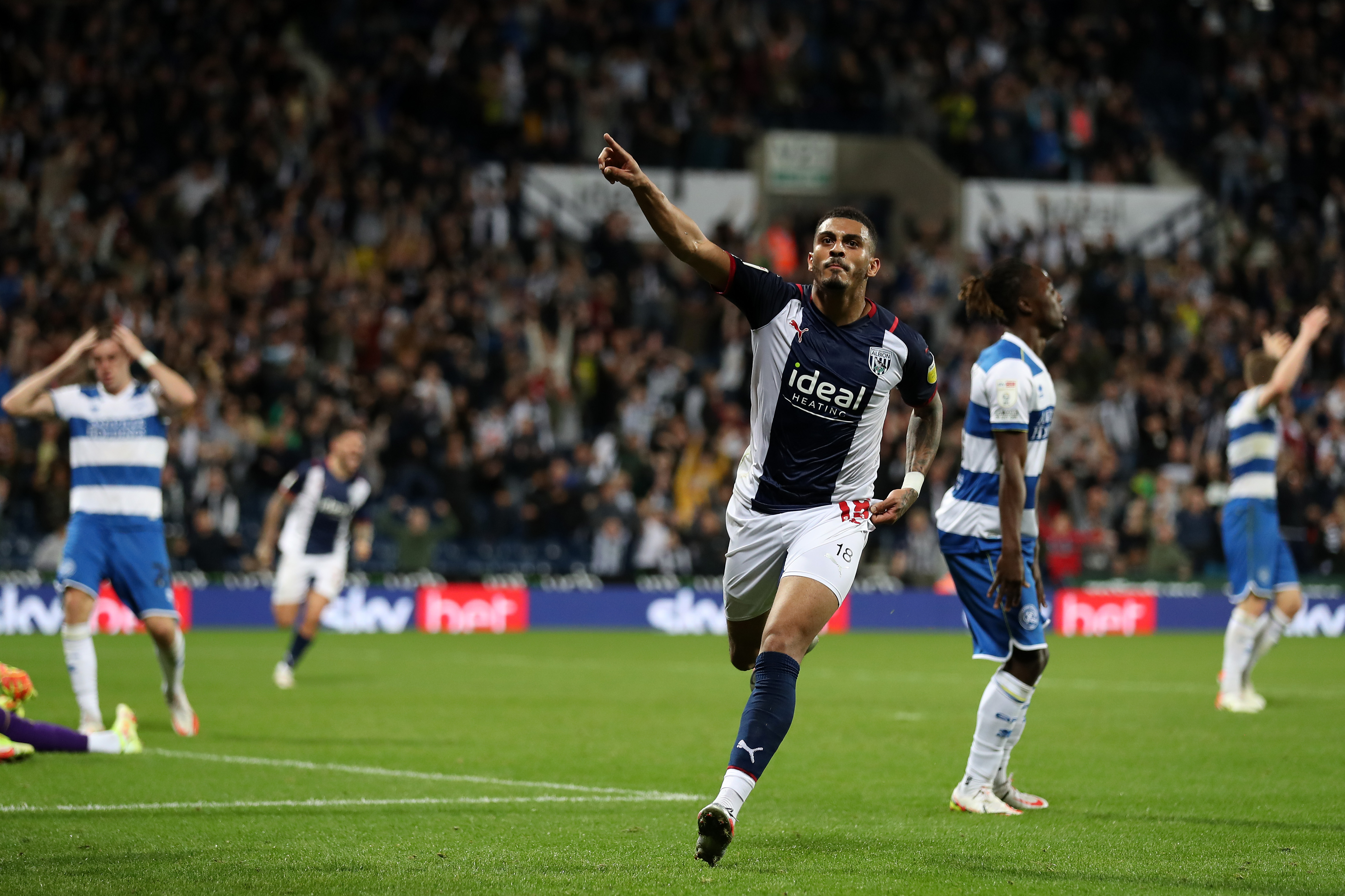 Karlan Grant celebrates scoring at The Hawthorns against QPR in September 2021