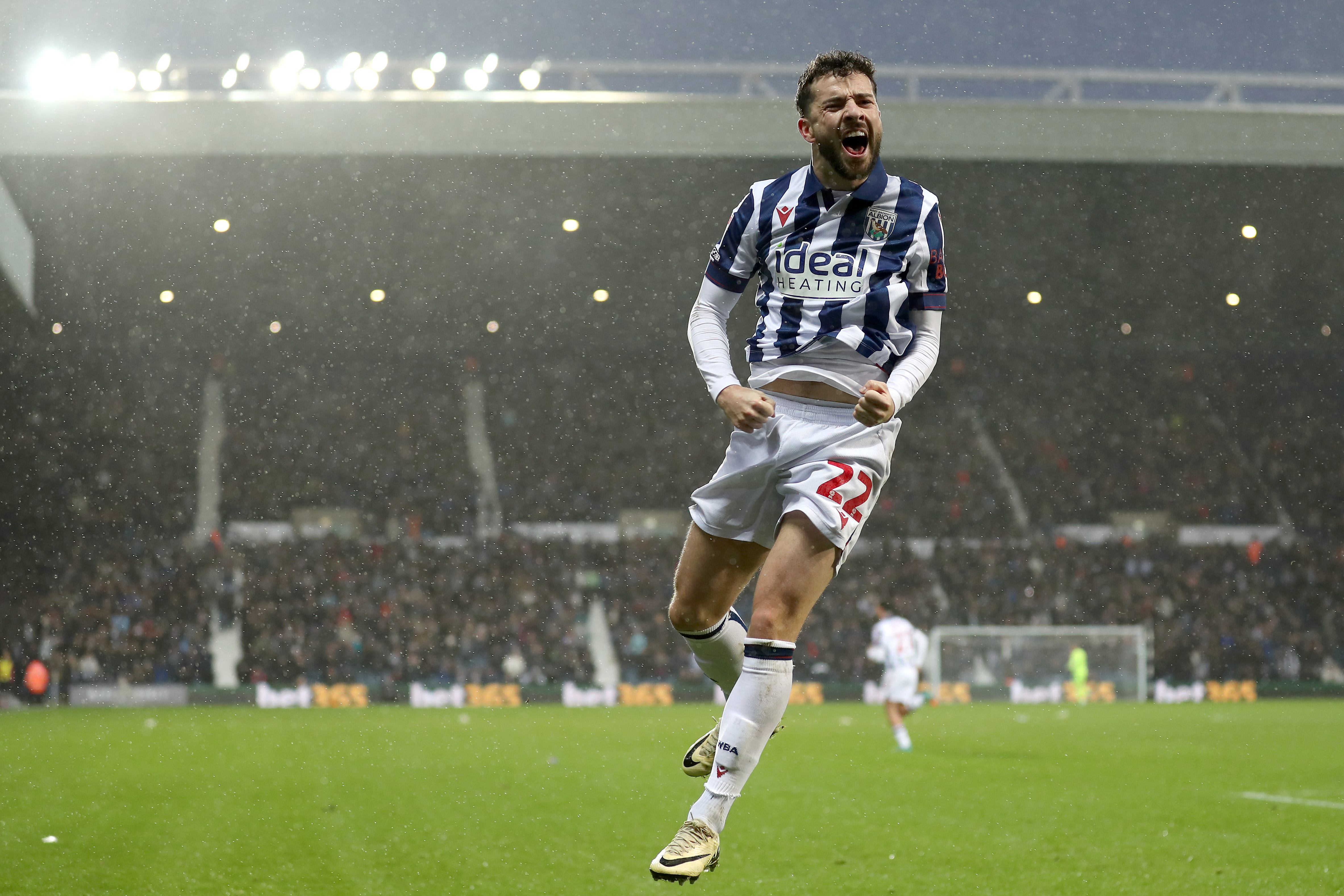 Mikey Johnston in the home kit celebrates scoring against Bristol City at The Hawthorns in December 2024