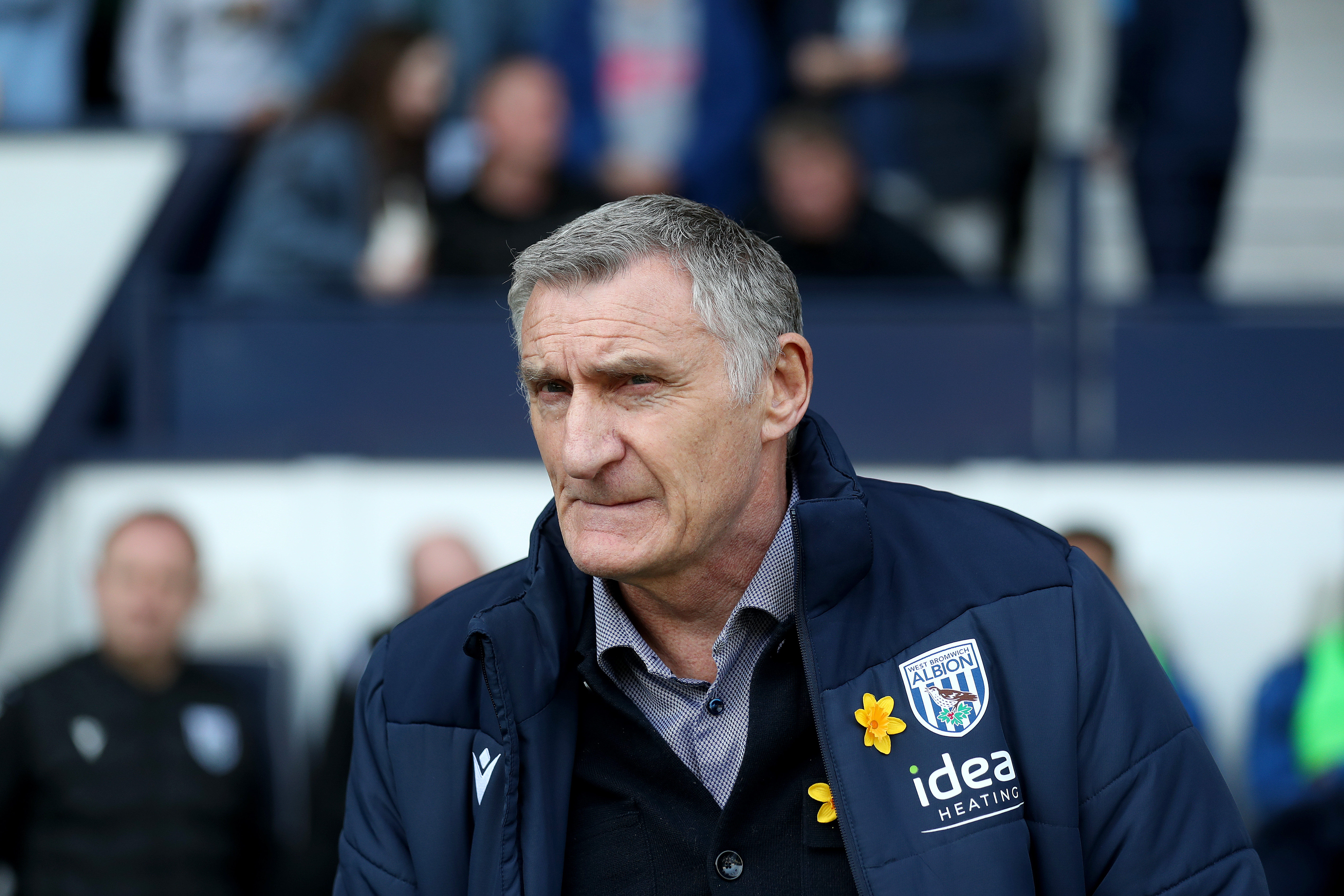 Tony Mowbray in a WBA coat on the side of the pitch at The Hawthorns 