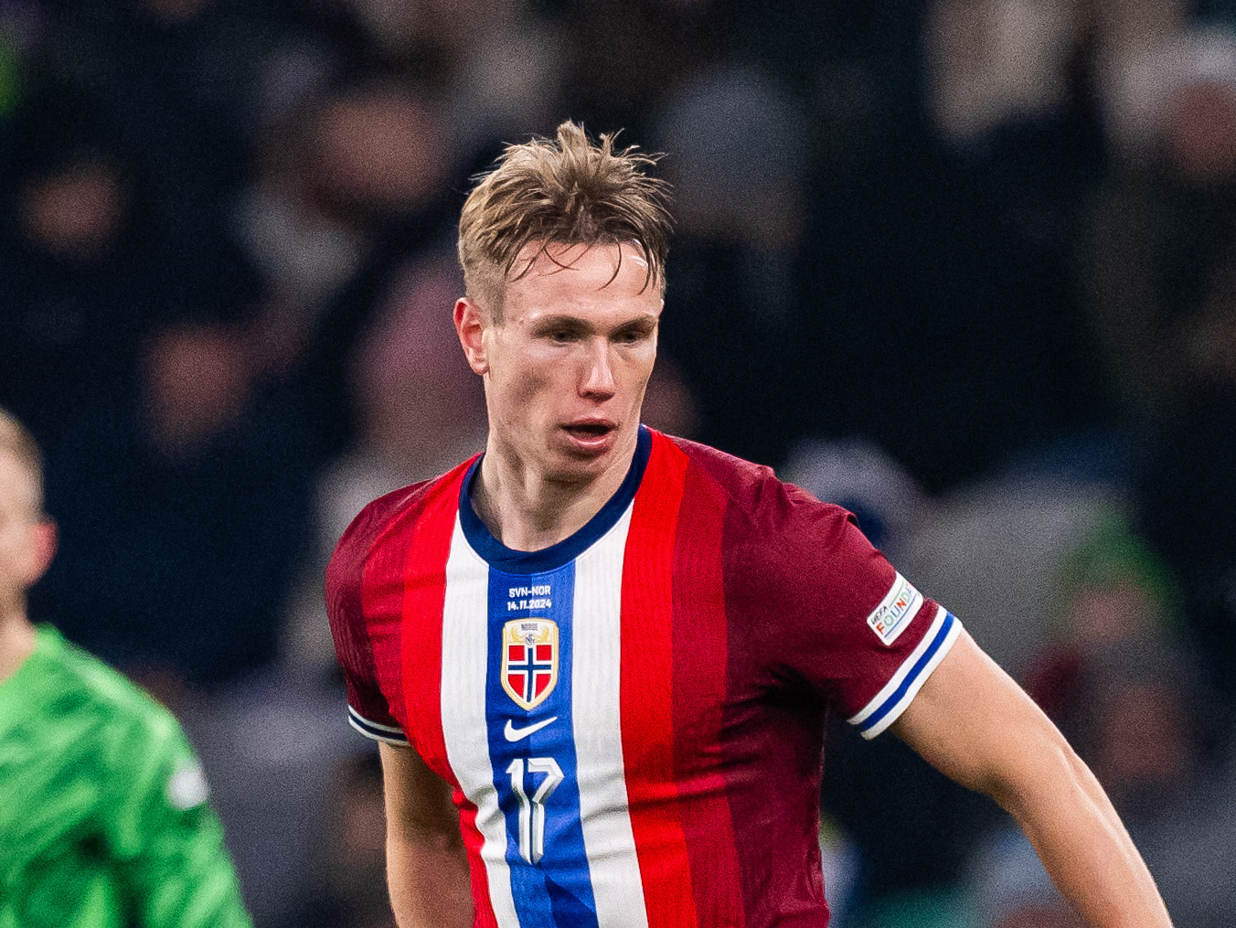 Torbjørn Heggem in action for Norway wearing their home kit 