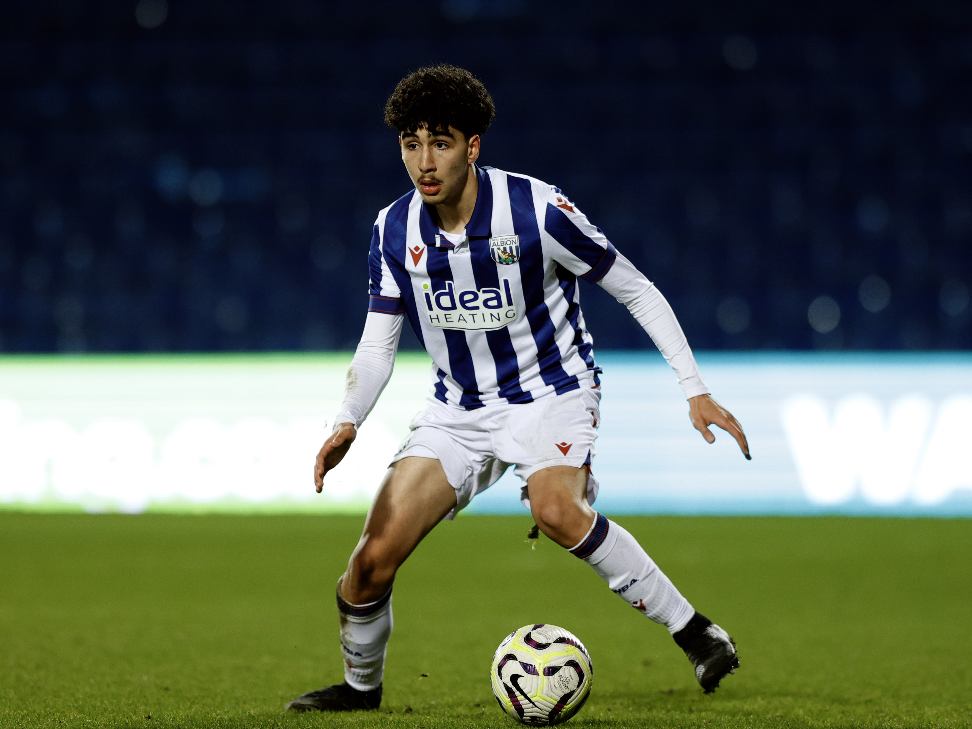 Adam Letlat in action for Albion u18s at The Hawthorns in the home kit 