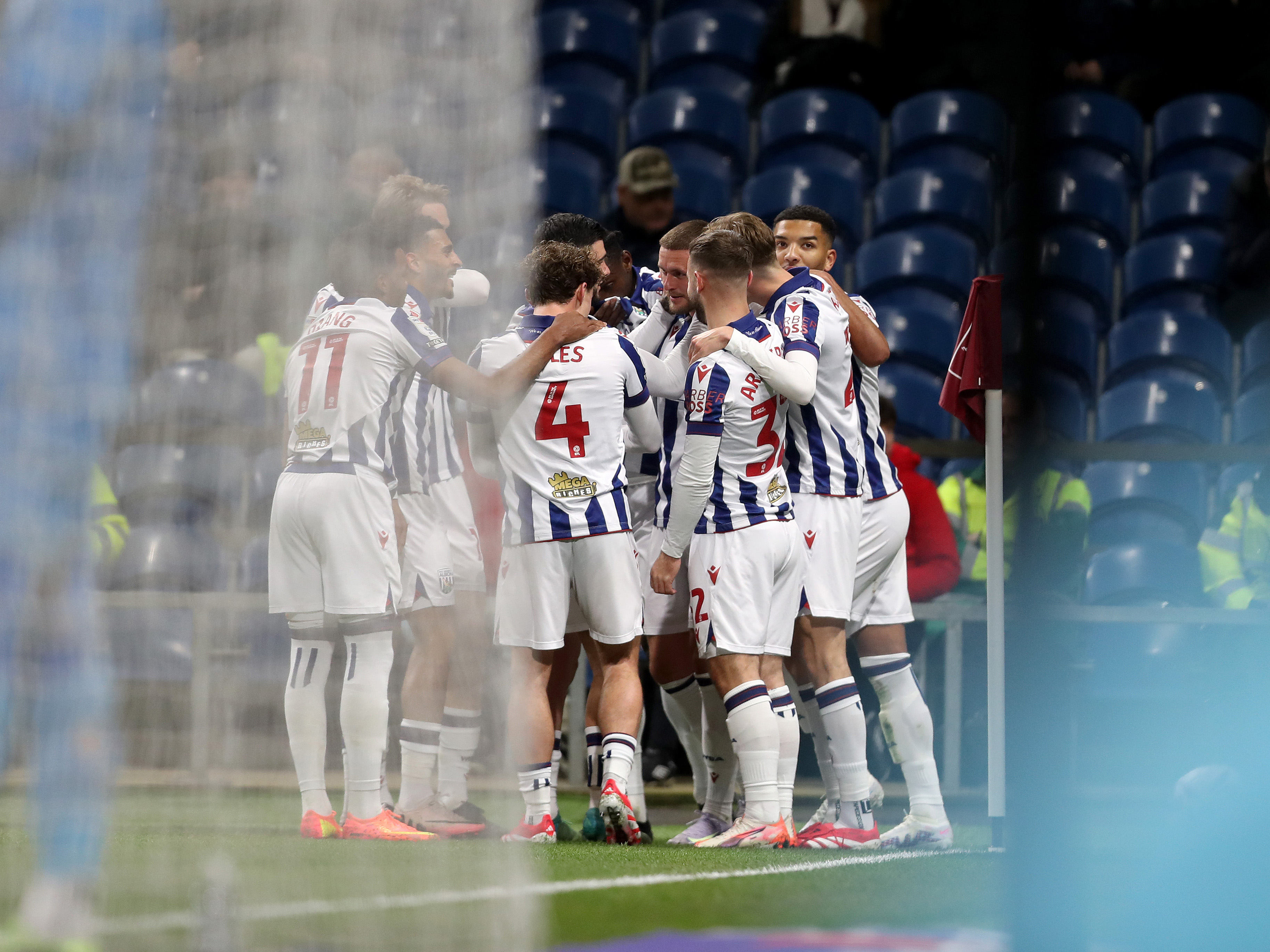 A photo of Albion players celebrating versus Burnley