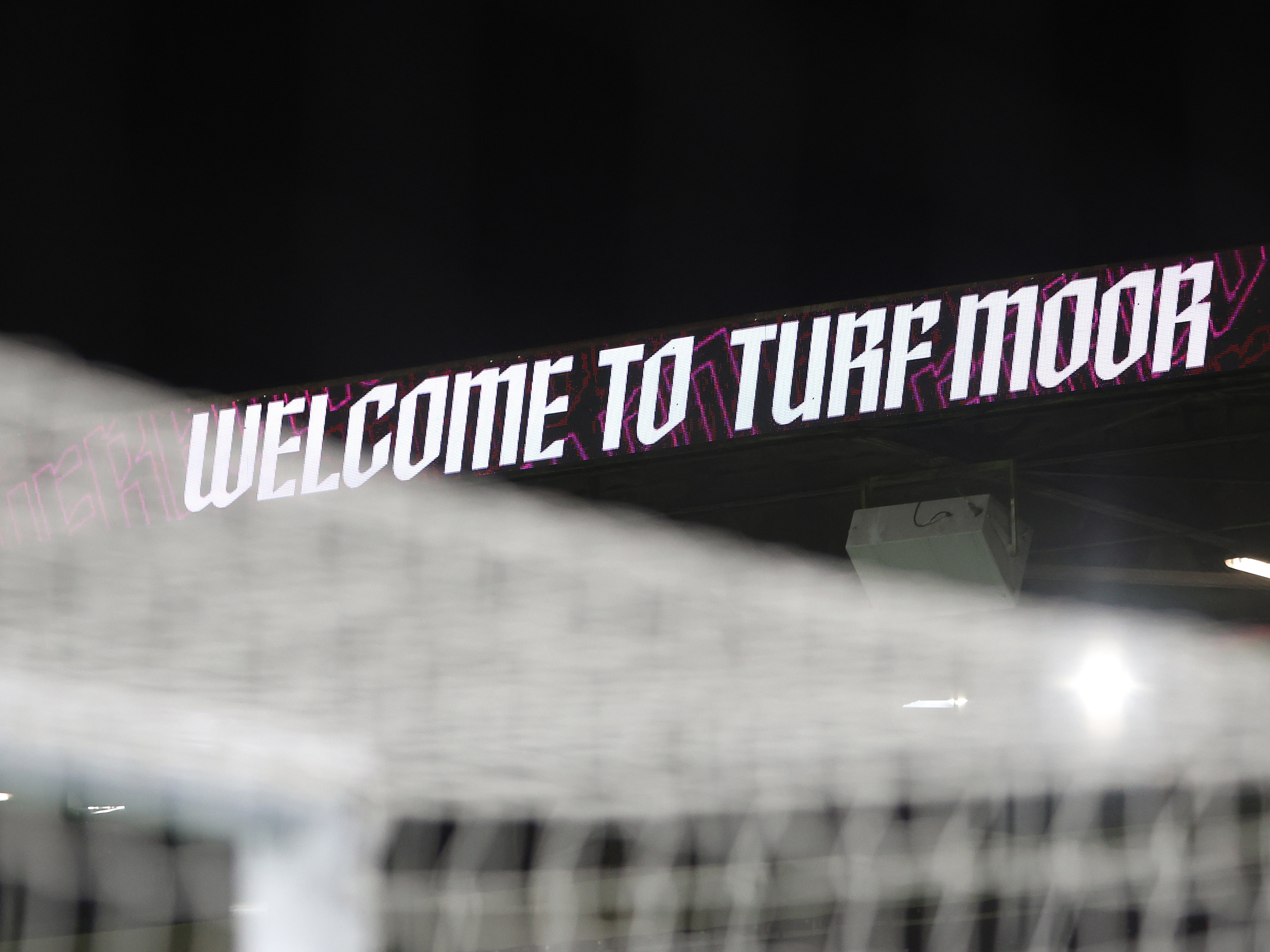 A screen at Turf Moor with a message saying welcome to Turf Moor